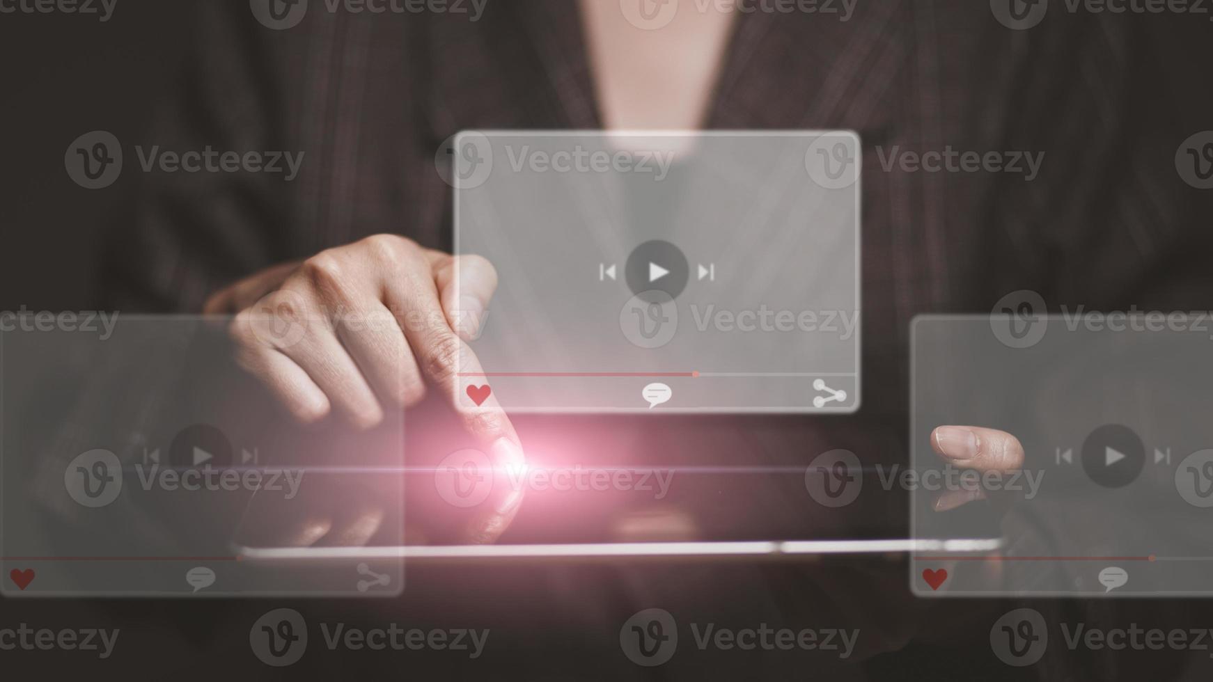 hands of women using tablet for streaming online, watching video on internet, live concert, show or tutorial photo