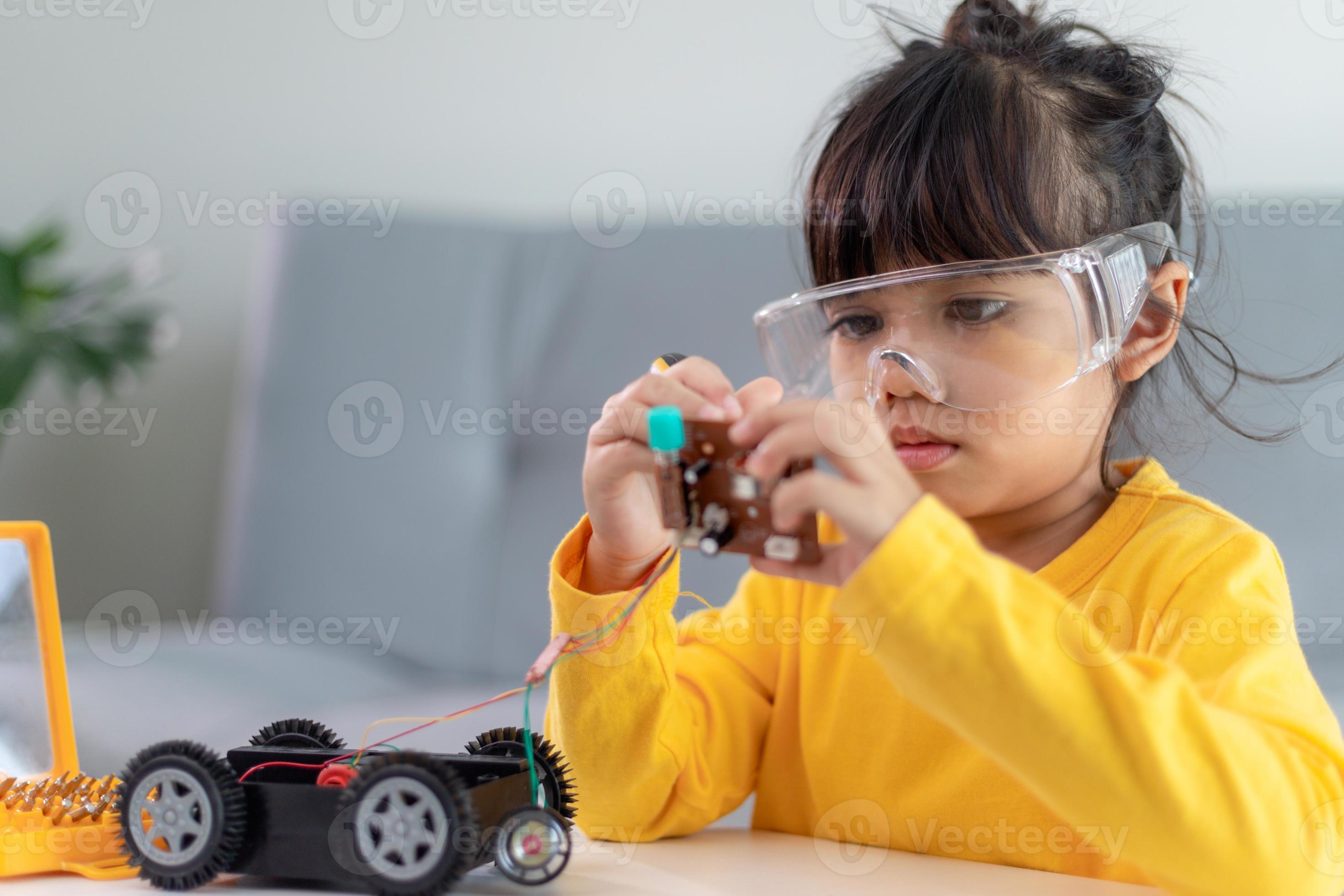 Asia students learn at home in coding robot cars and electronic board ...