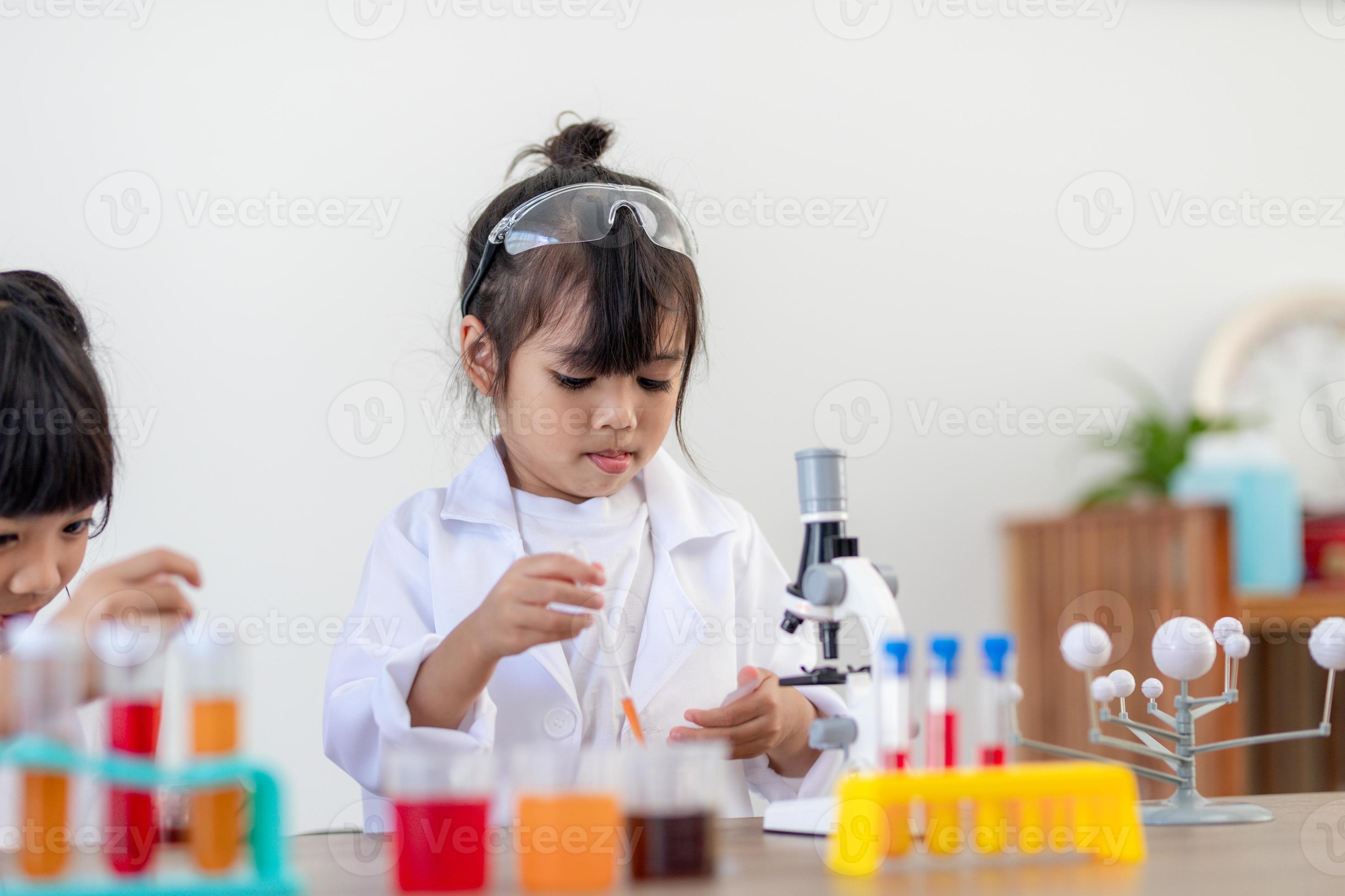 Education Science Chemistry And Children Concept Kids Or Students education-science-chemistry-and-children-concept-kids-or-students