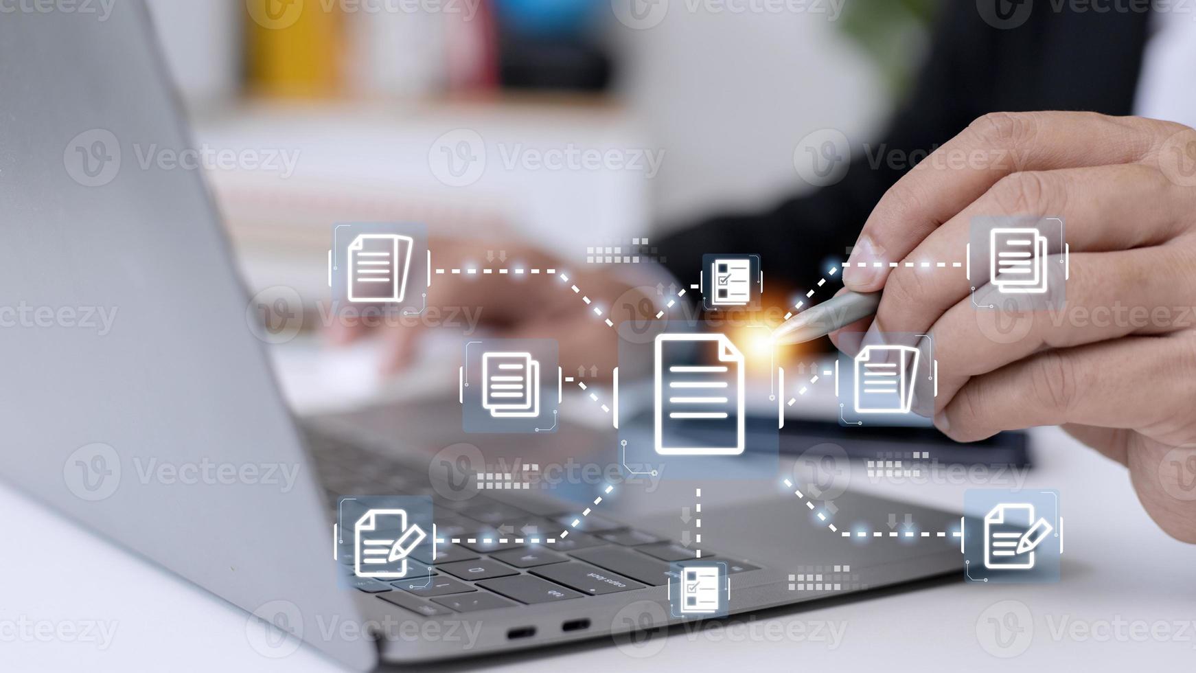 Businessman working with electronics document icons, E-document management, online documentation database, paperless office concept photo