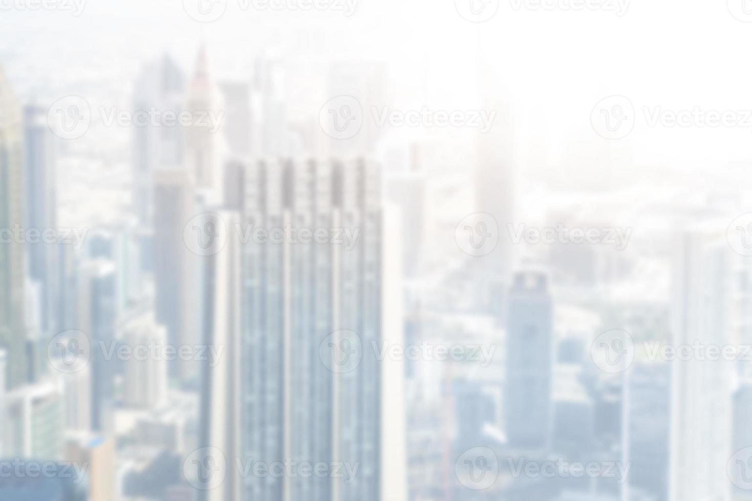 Abstract blur city estate buildings in morning view background. Cityscape skyline from top office window view. Blurred outside bokeh real architecture modern company construction town morning outdoor. photo