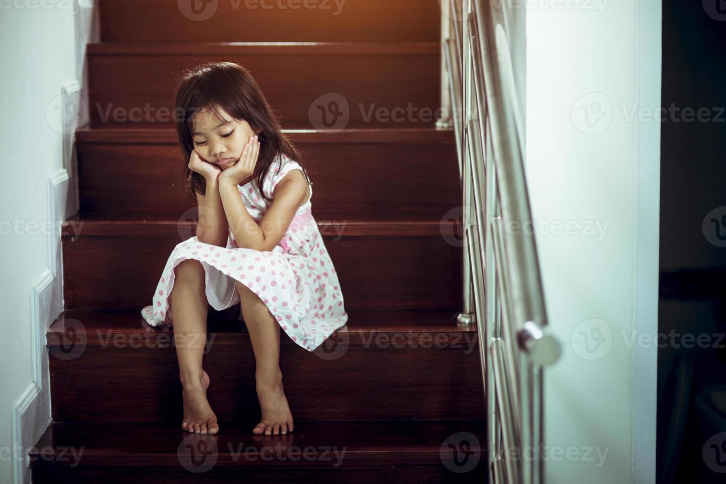 Sad child from this father and mother arguing, family negative concept.vintage color photo