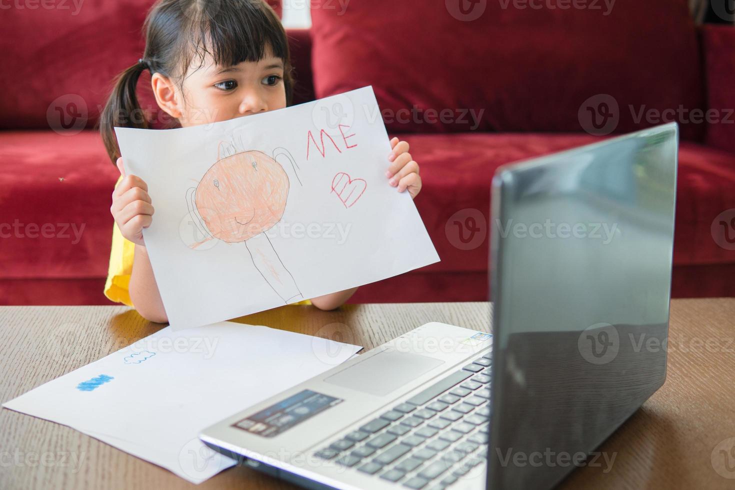 Asian girl student online learning class study online with laptop at home. photo