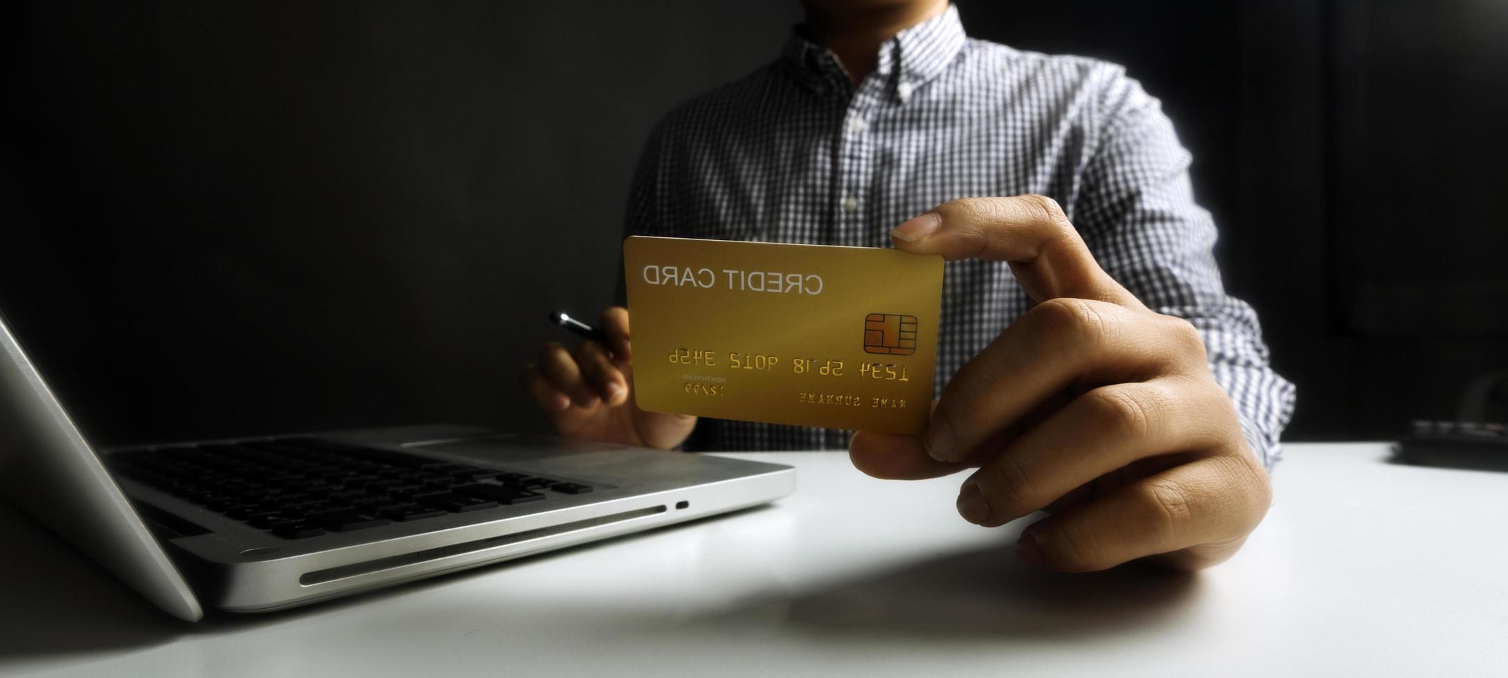 Woman hand using mobile smart phone, online payment, banking and online shopping at the home. photo