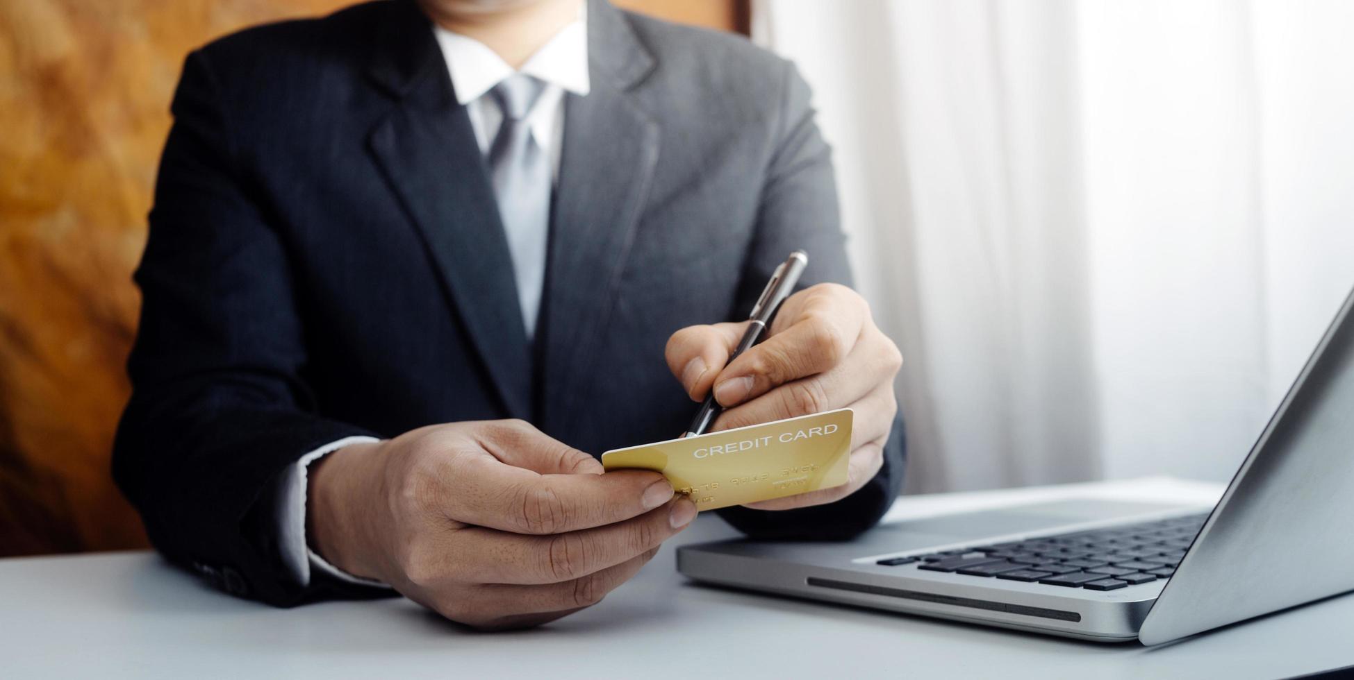 Woman hand using mobile smart phone, online payment, banking and online shopping at the home. photo