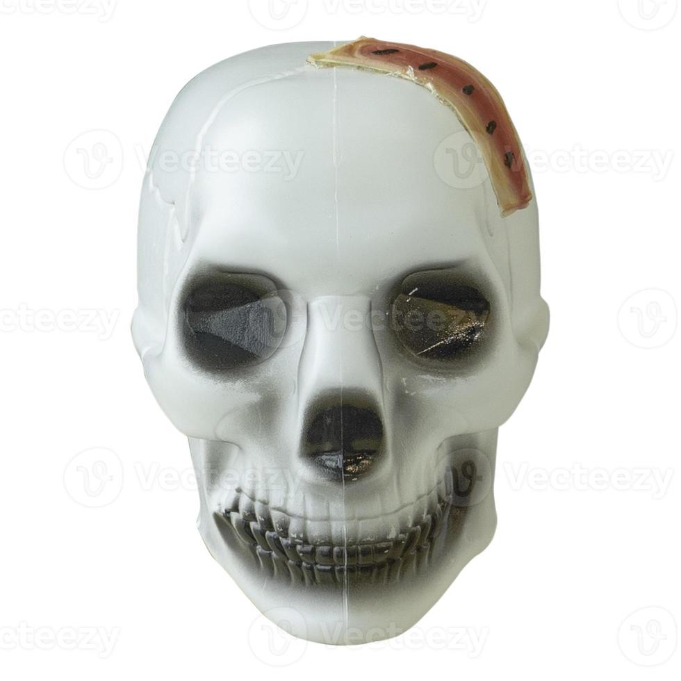cabeza de calavera falsa hecha de plástico blanco gris ojo negro se puede utilizar para festivales de halloween foto