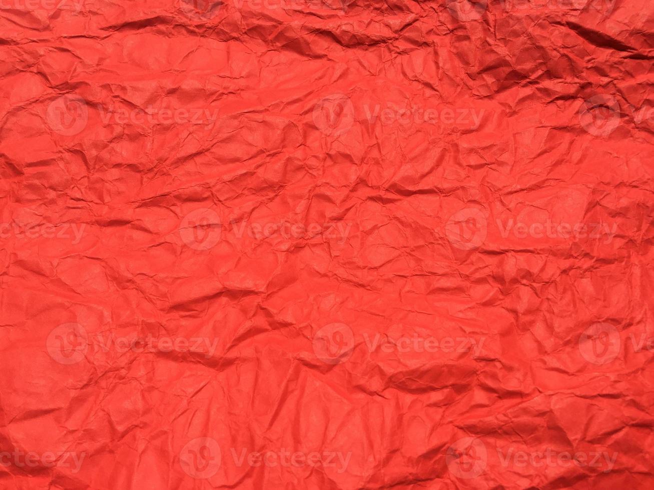 Red crumpled paper texture background for Design. Wallpaper  for copy space photo
