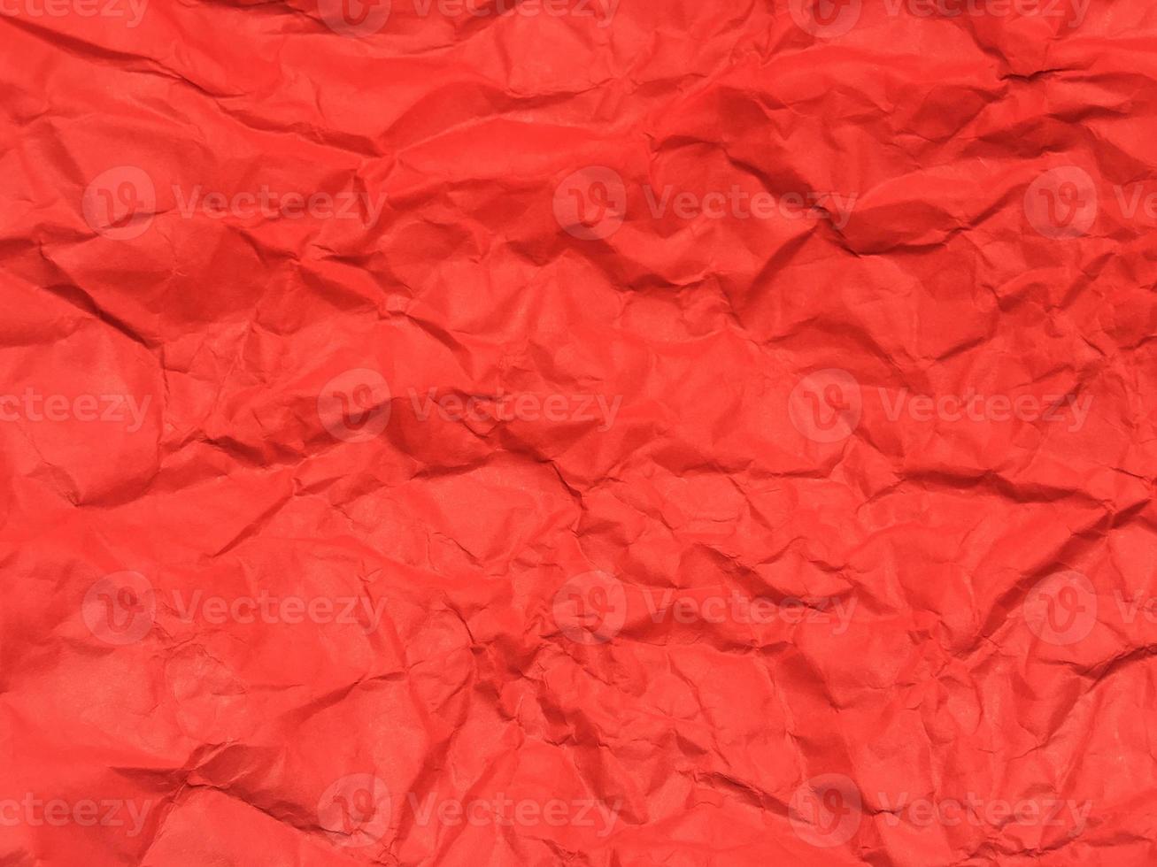 Red crumpled paper texture background for Design. Wallpaper  for copy space photo