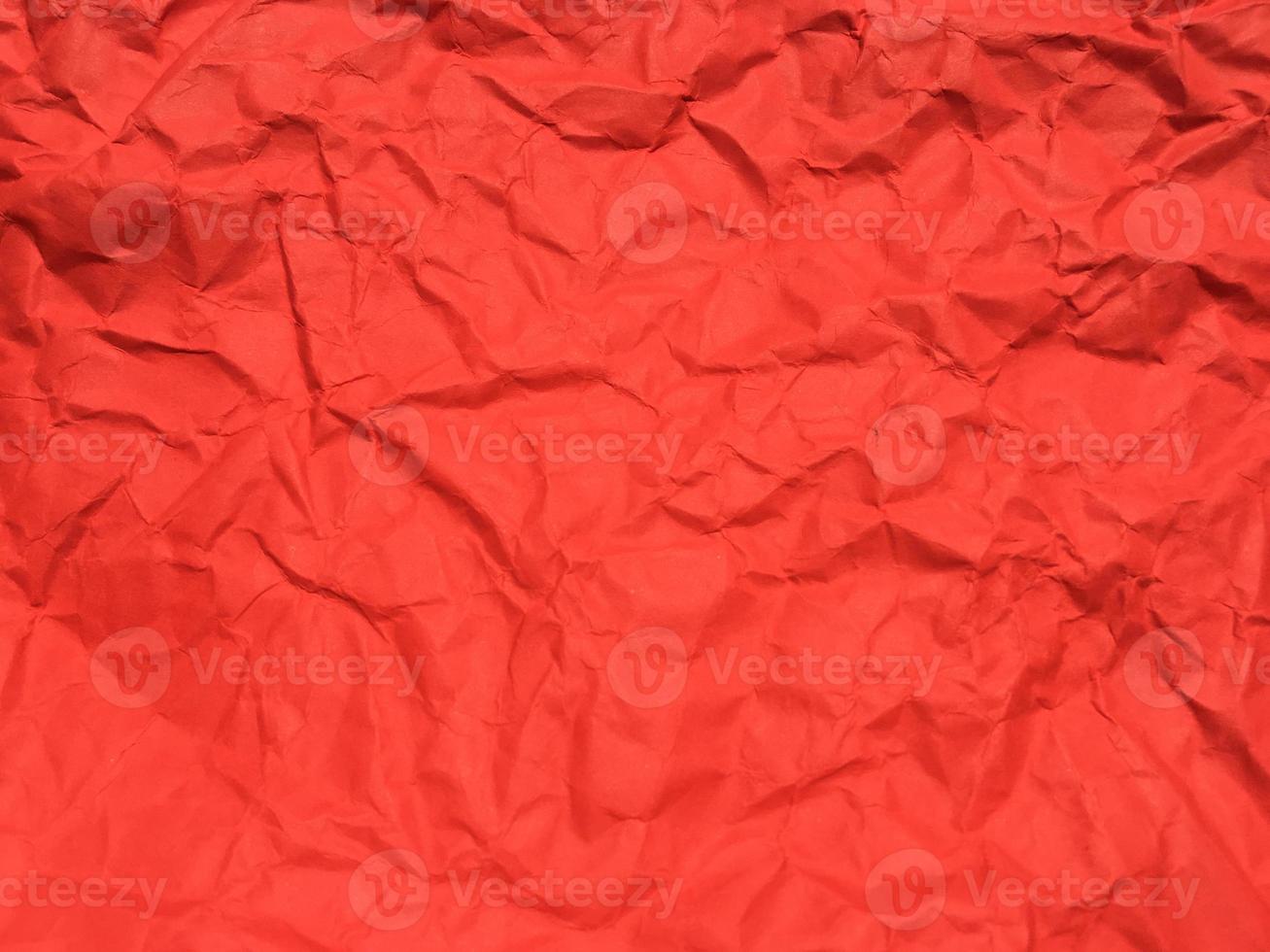 Red crumpled paper texture background for Design. Wallpaper  for copy space photo
