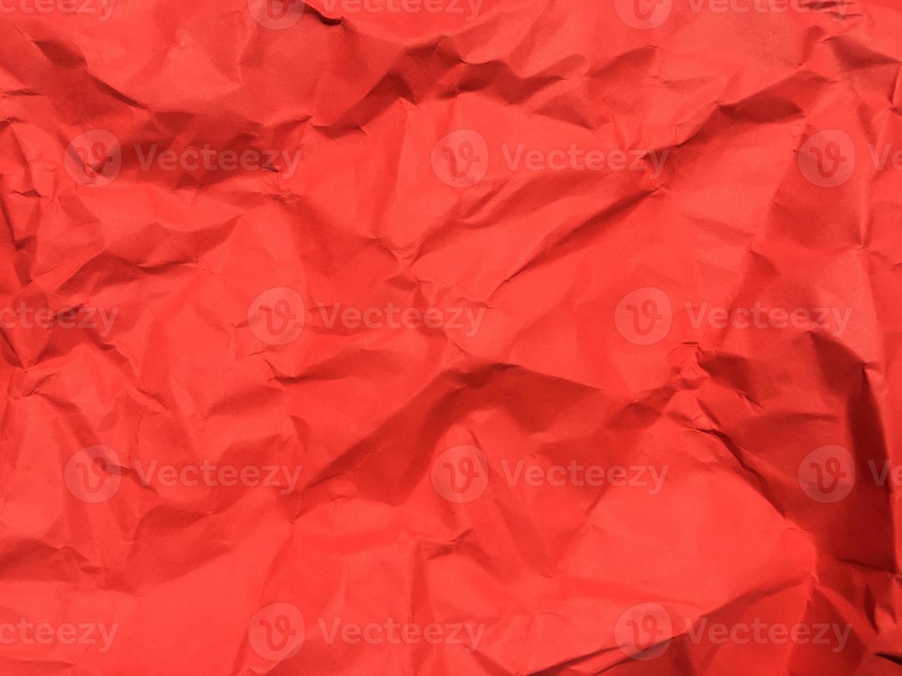Red crumpled paper texture background for Design. Wallpaper  for copy space photo