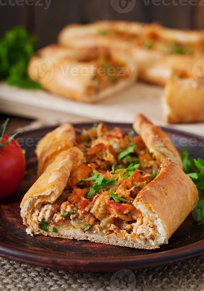 Turkish pide traditional food with beef and vegetables photo