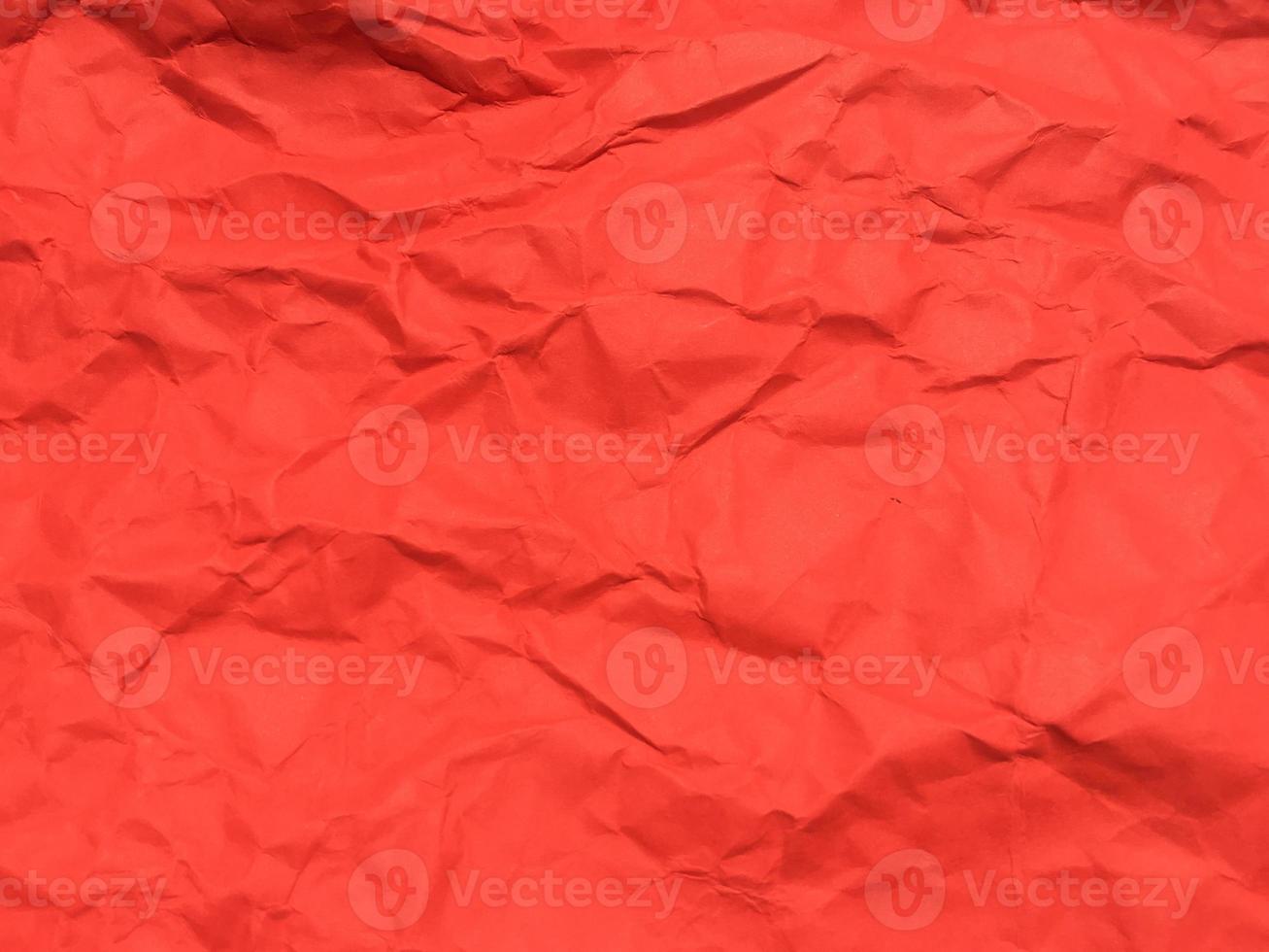 Red crumpled paper texture background for Design. Wallpaper  for copy space photo