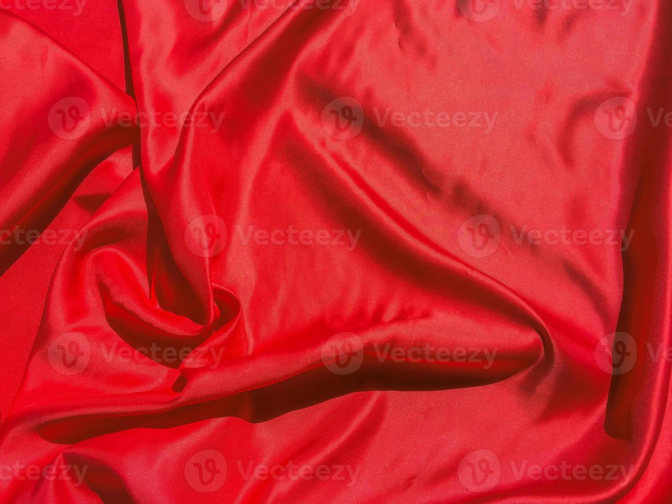 Red fabric texture for backgroundwith coy space. Valentines Day or Christmas Day wallpaper design photo
