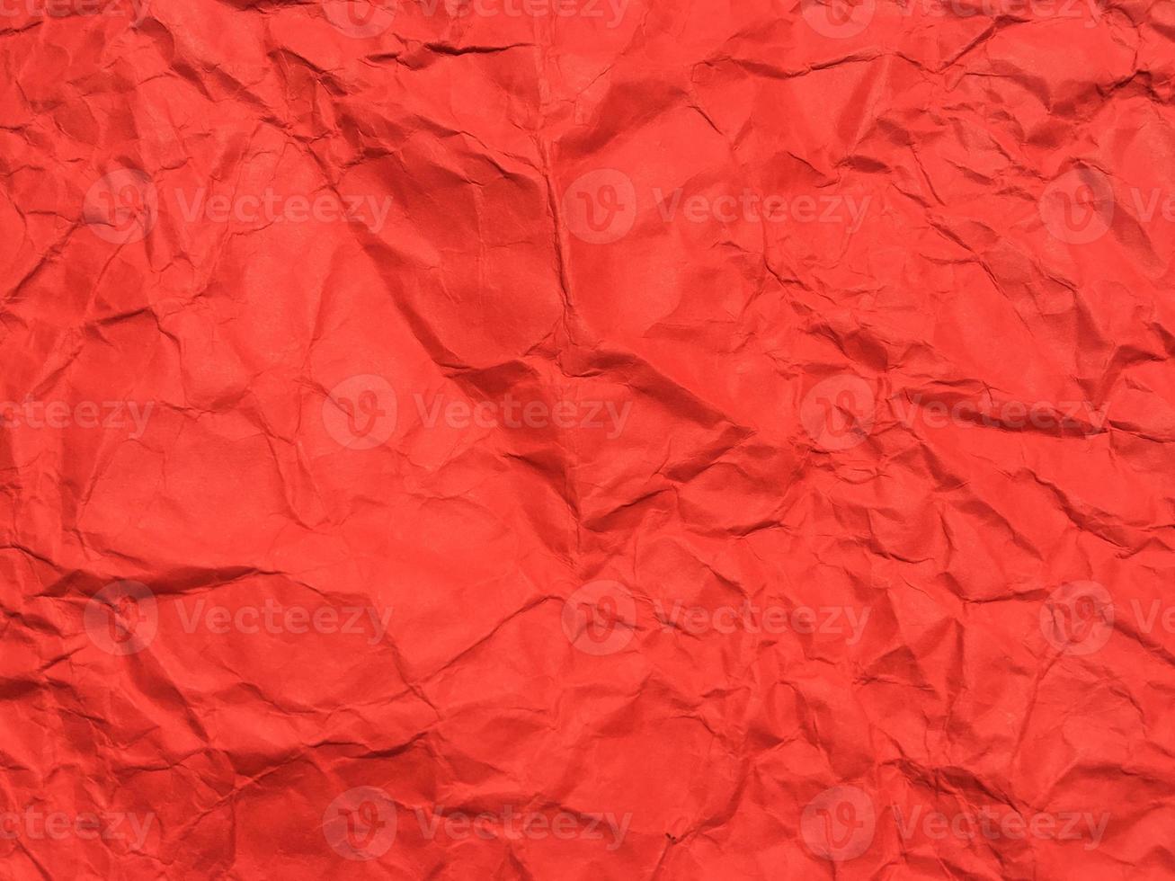 Red crumpled paper texture background for Design. Wallpaper  for copy space photo