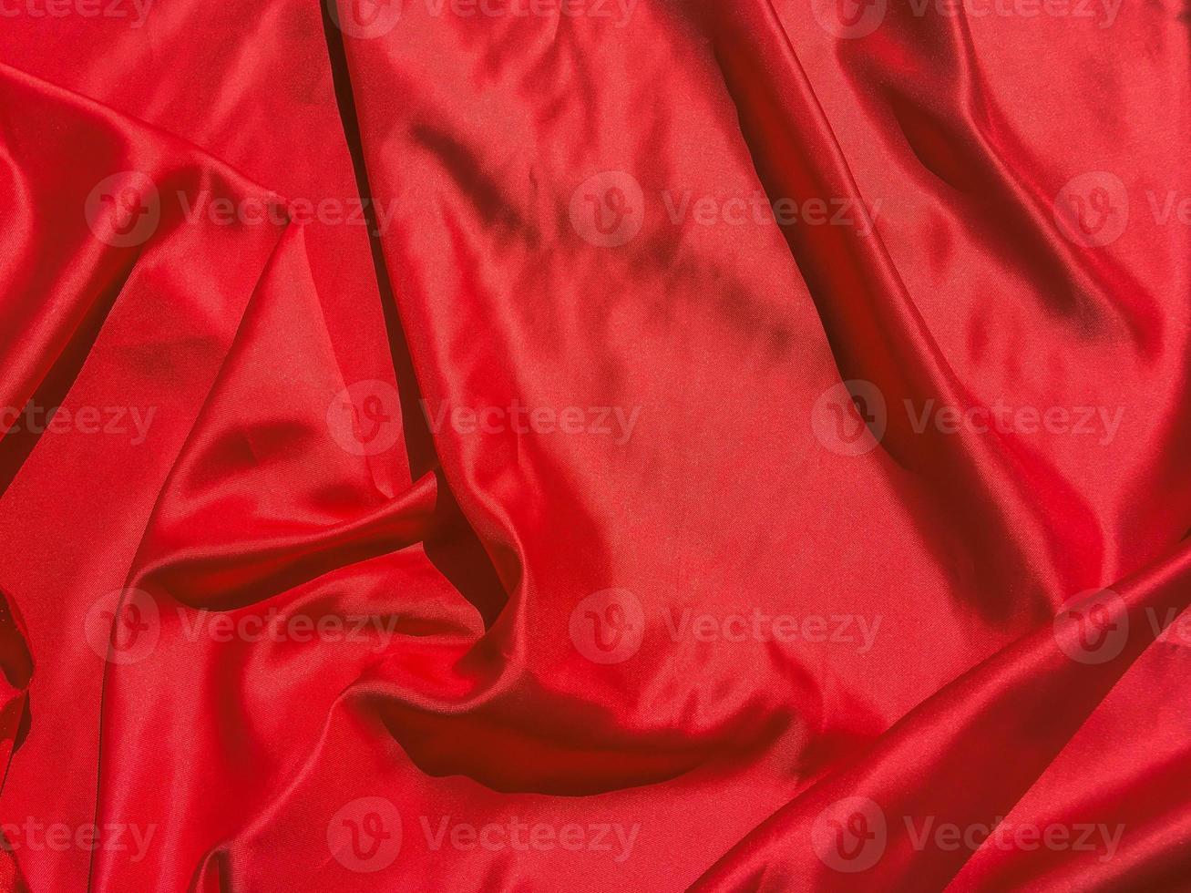Red fabric texture for backgroundwith coy space. Valentines Day or Christmas Day wallpaper design photo