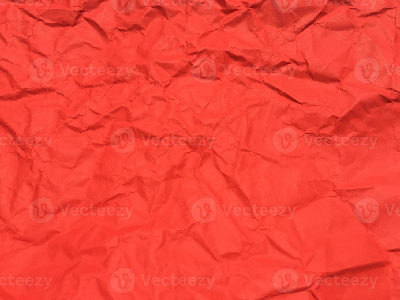 Red crumpled paper texture background for Design. Wallpaper  for copy space photo