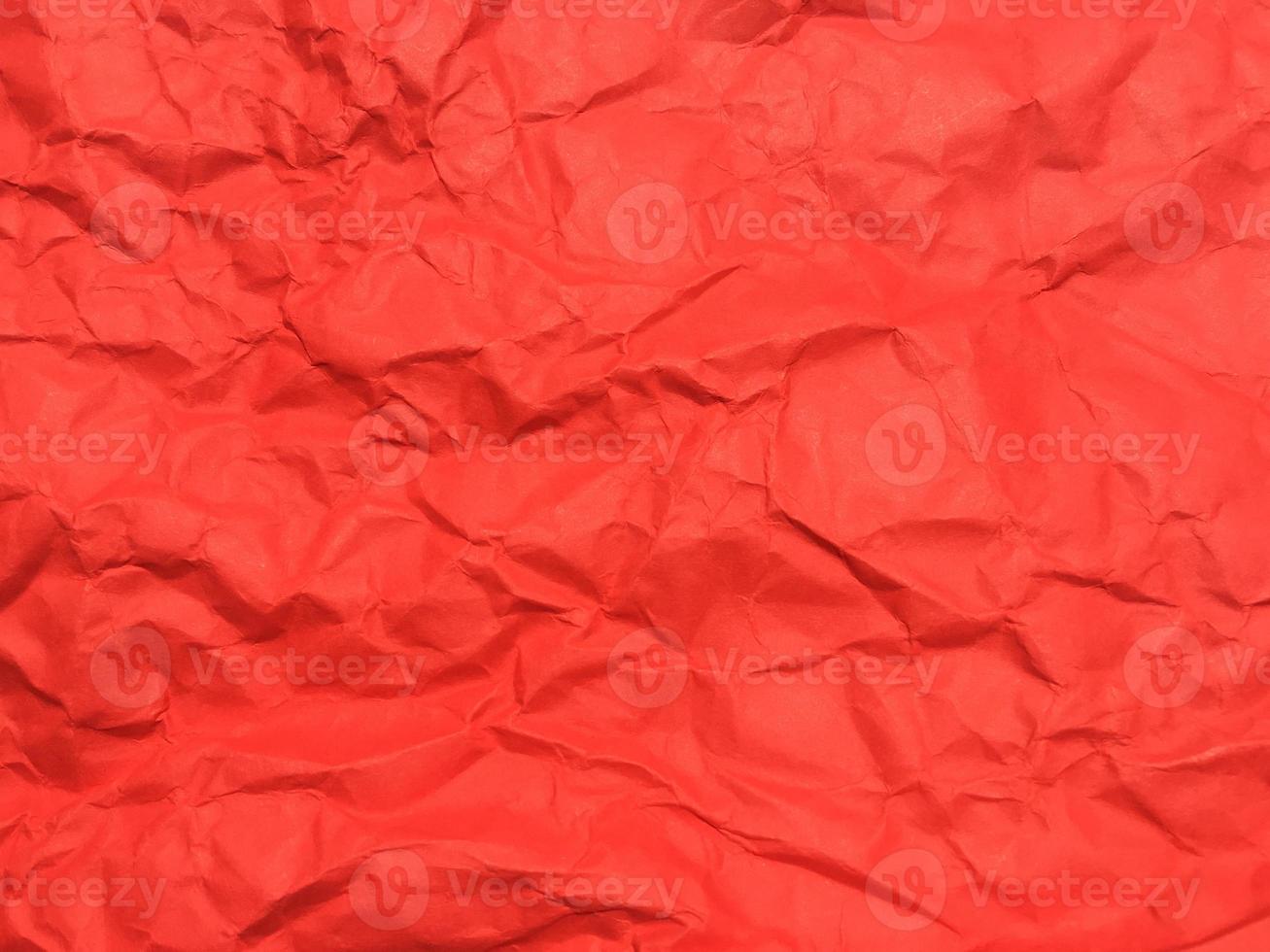 Red crumpled paper texture background for Design. Wallpaper  for copy space photo
