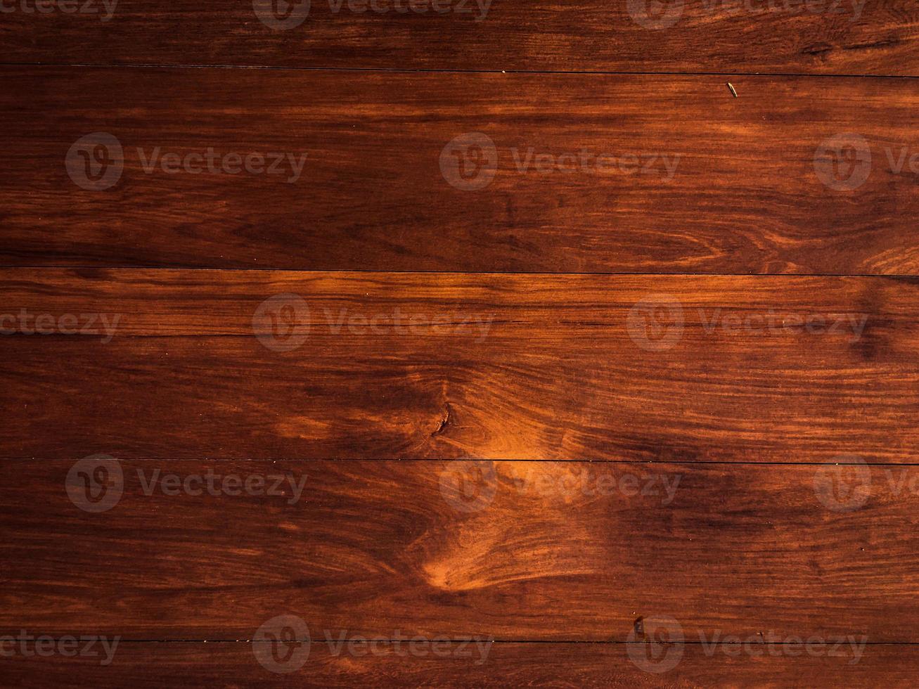 Walnut planks texture for background with space for work. Top view photo