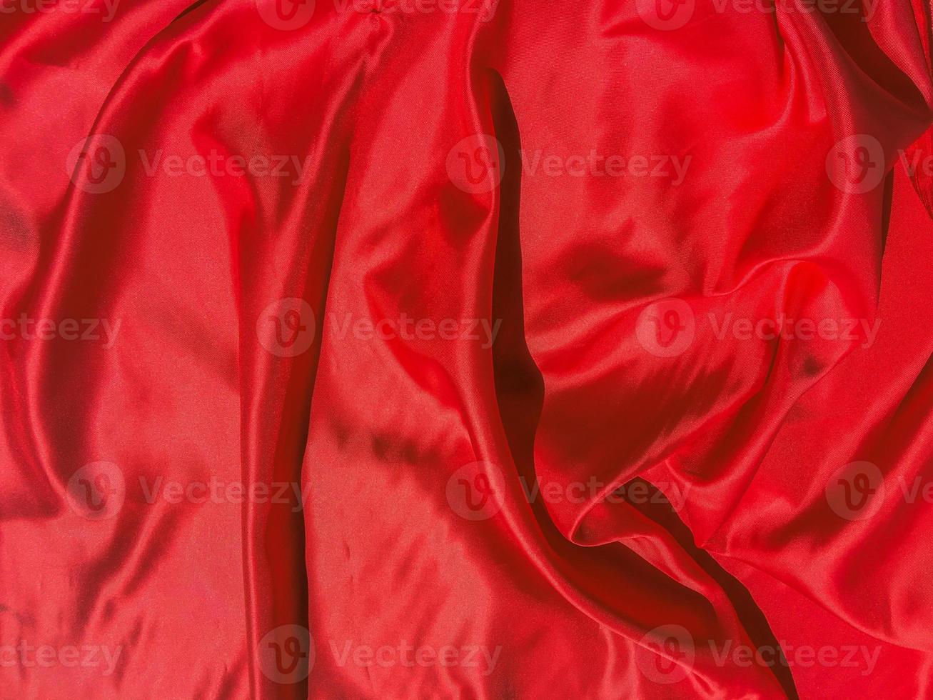 Red fabric texture for backgroundwith coy space. Valentines Day or Christmas Day wallpaper design photo