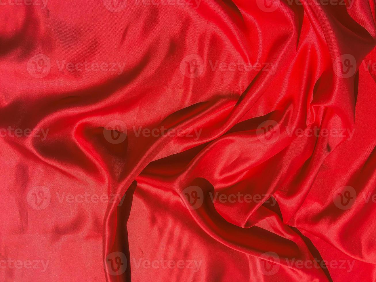 Red fabric texture for backgroundwith coy space. Valentines Day or Christmas Day wallpaper design photo