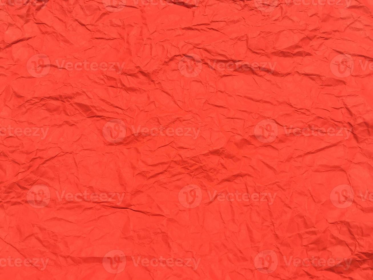 Red crumpled paper texture background for Design. Wallpaper  for copy space photo