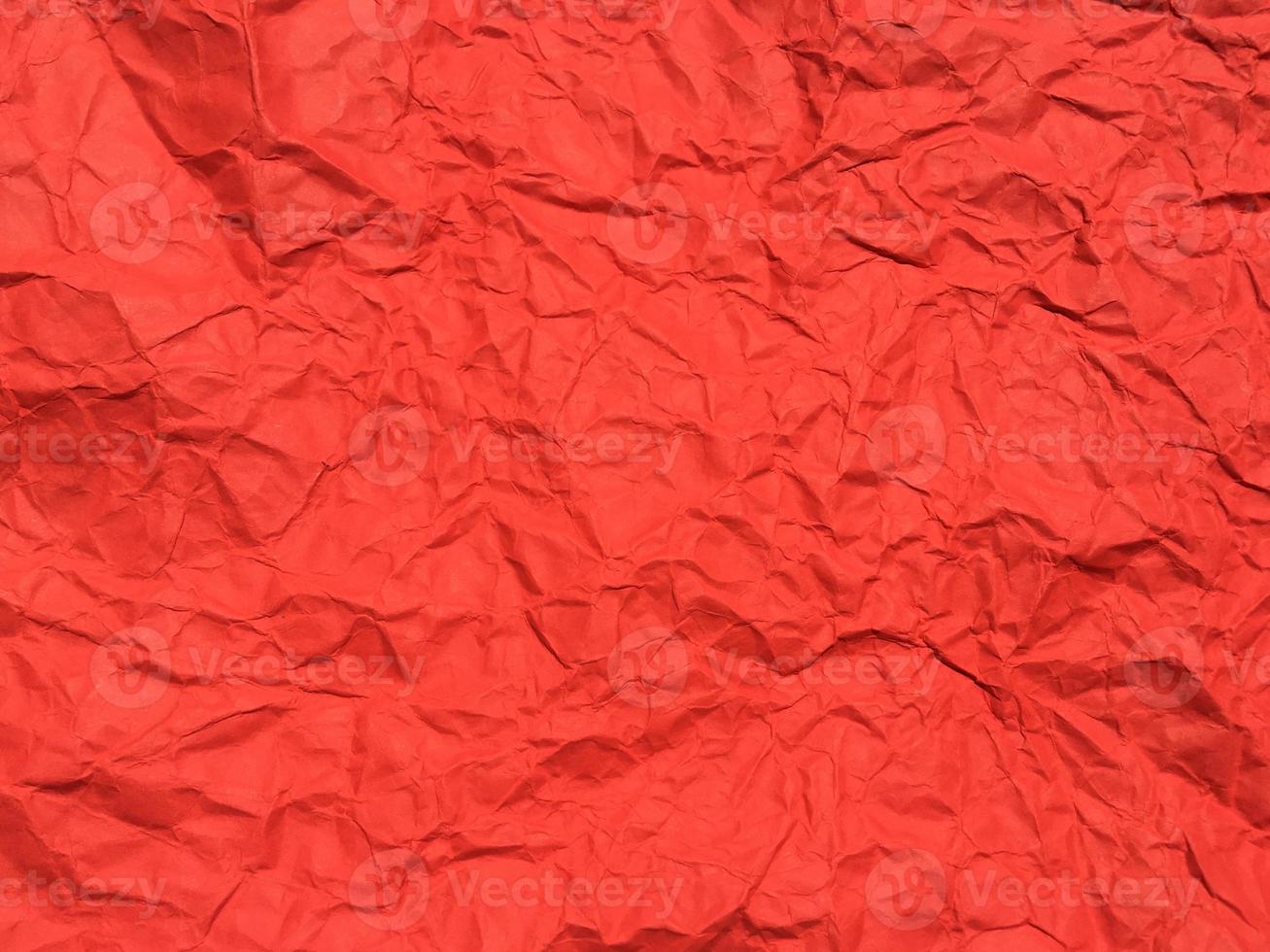 Red crumpled paper texture background for Design. Wallpaper  for copy space photo