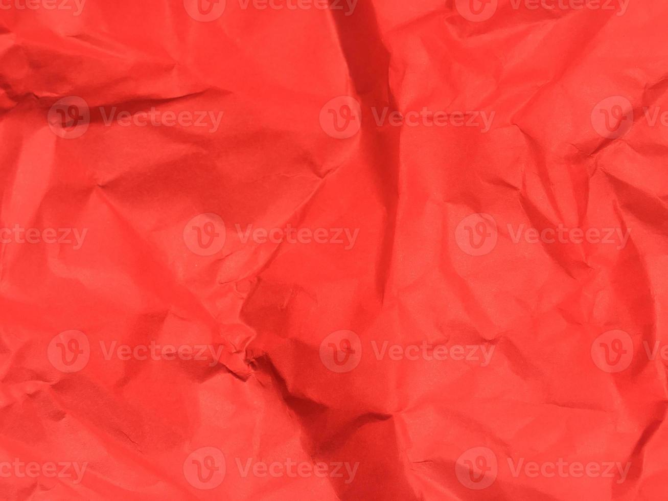 Red crumpled paper texture background for Design. Wallpaper  for copy space photo