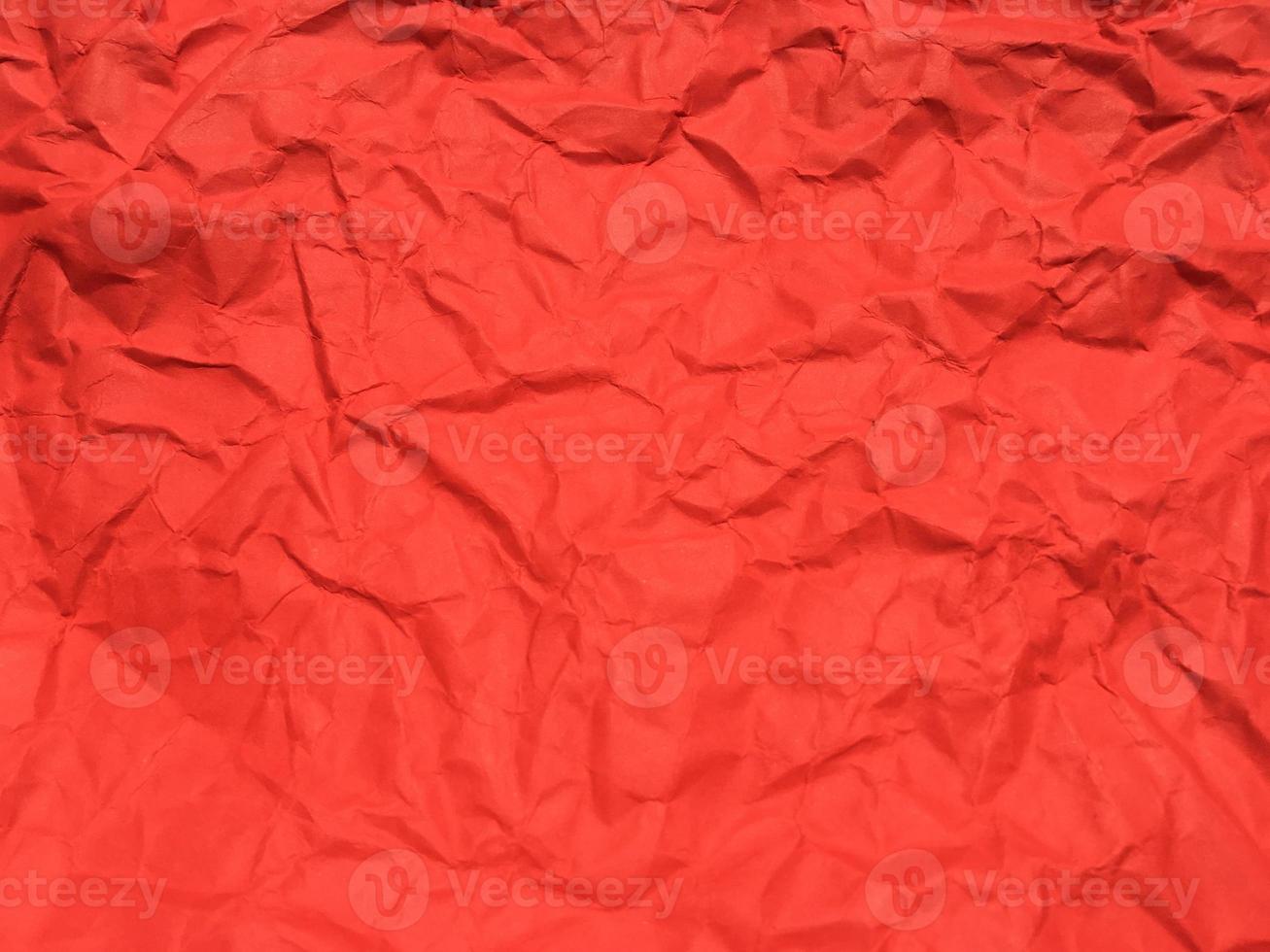 Red crumpled paper texture background for Design. Wallpaper  for copy space photo