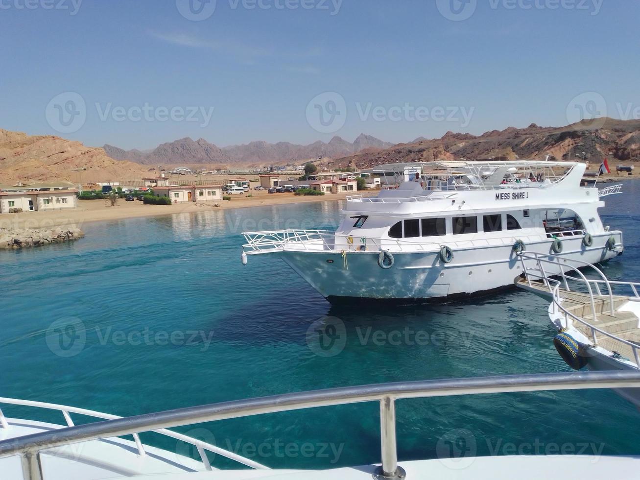 Harbor with yachts in the port of the Egyptian city of Sharm El Sheikh photo