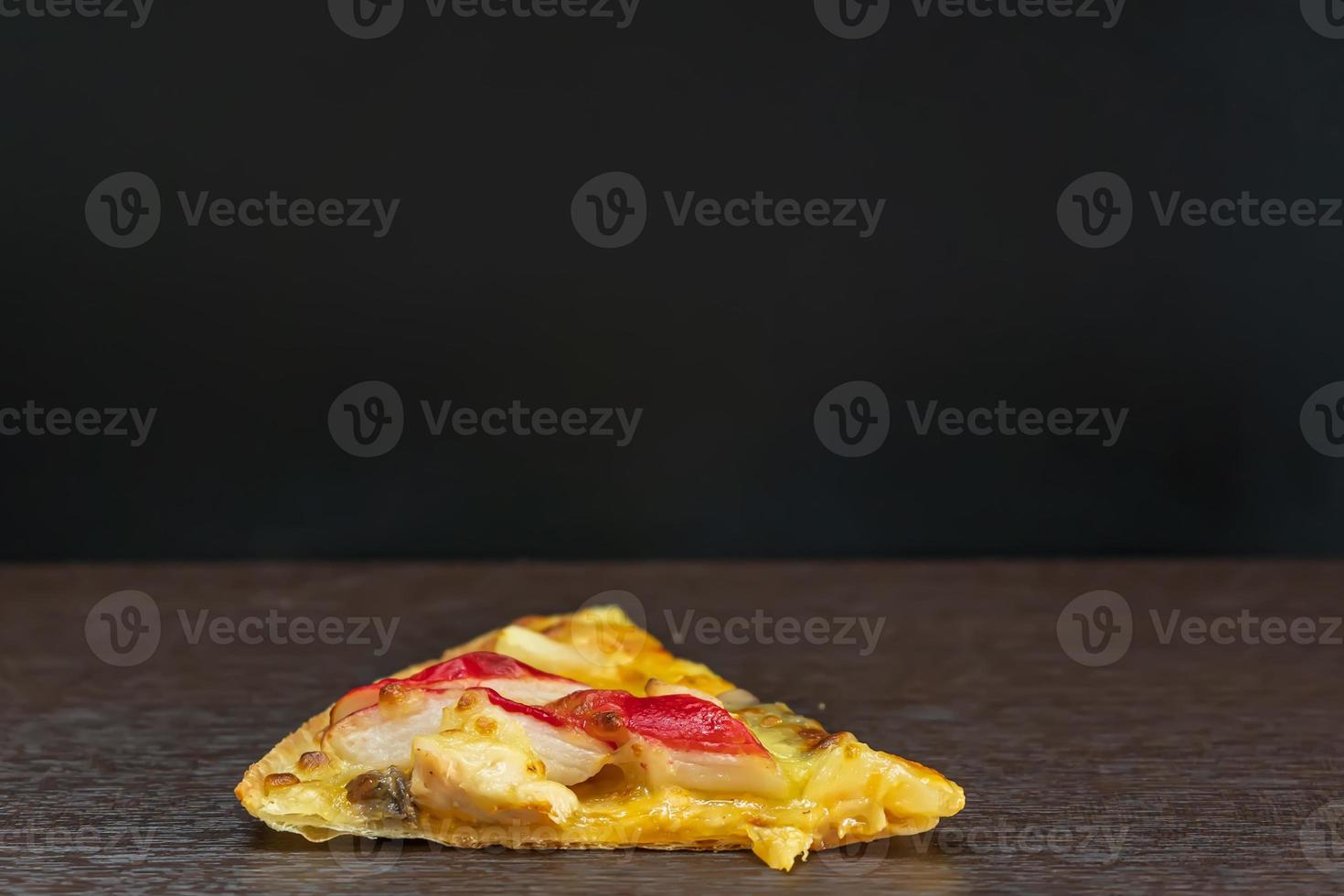 Pizza on the wooden photo