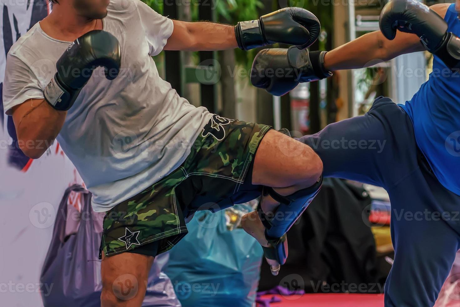 Sparring thai boxing in a boxing stadium. photo