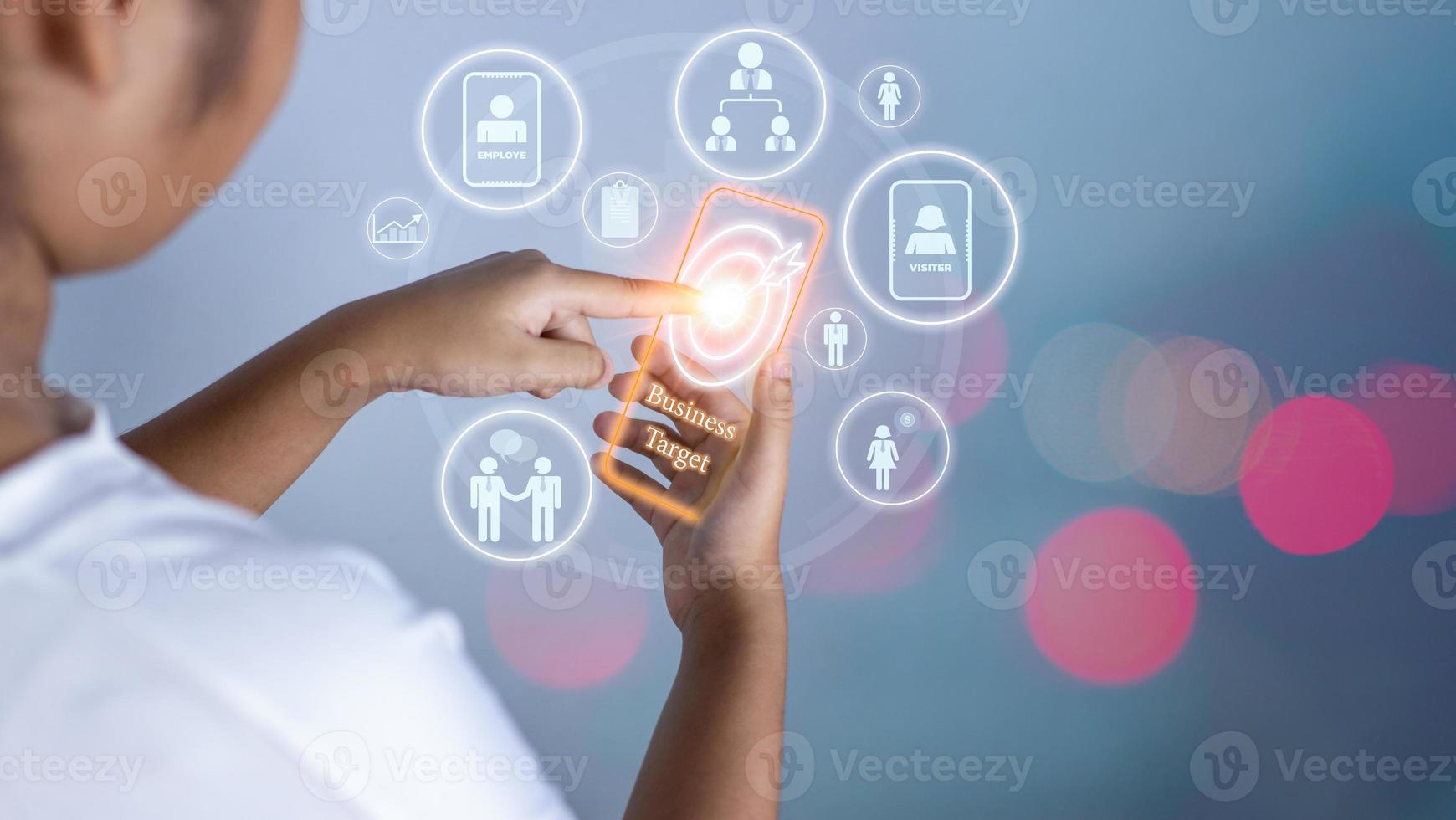 woman pointing at dart board icon Represents the goal setting for business, concept of startup, financial planning, development strategy, business goal setting. photo
