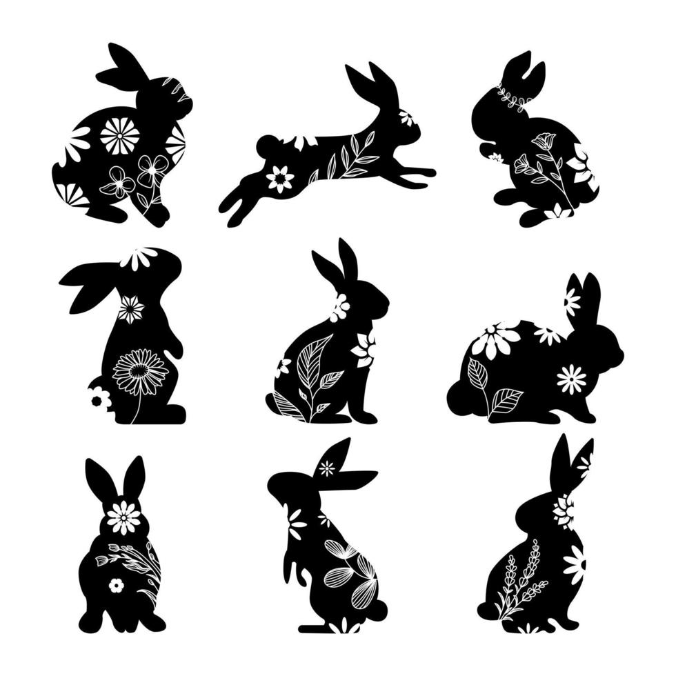 colección de conejos negros con motivos florales. decoración del conejito de pascua. silueta de conejo vector