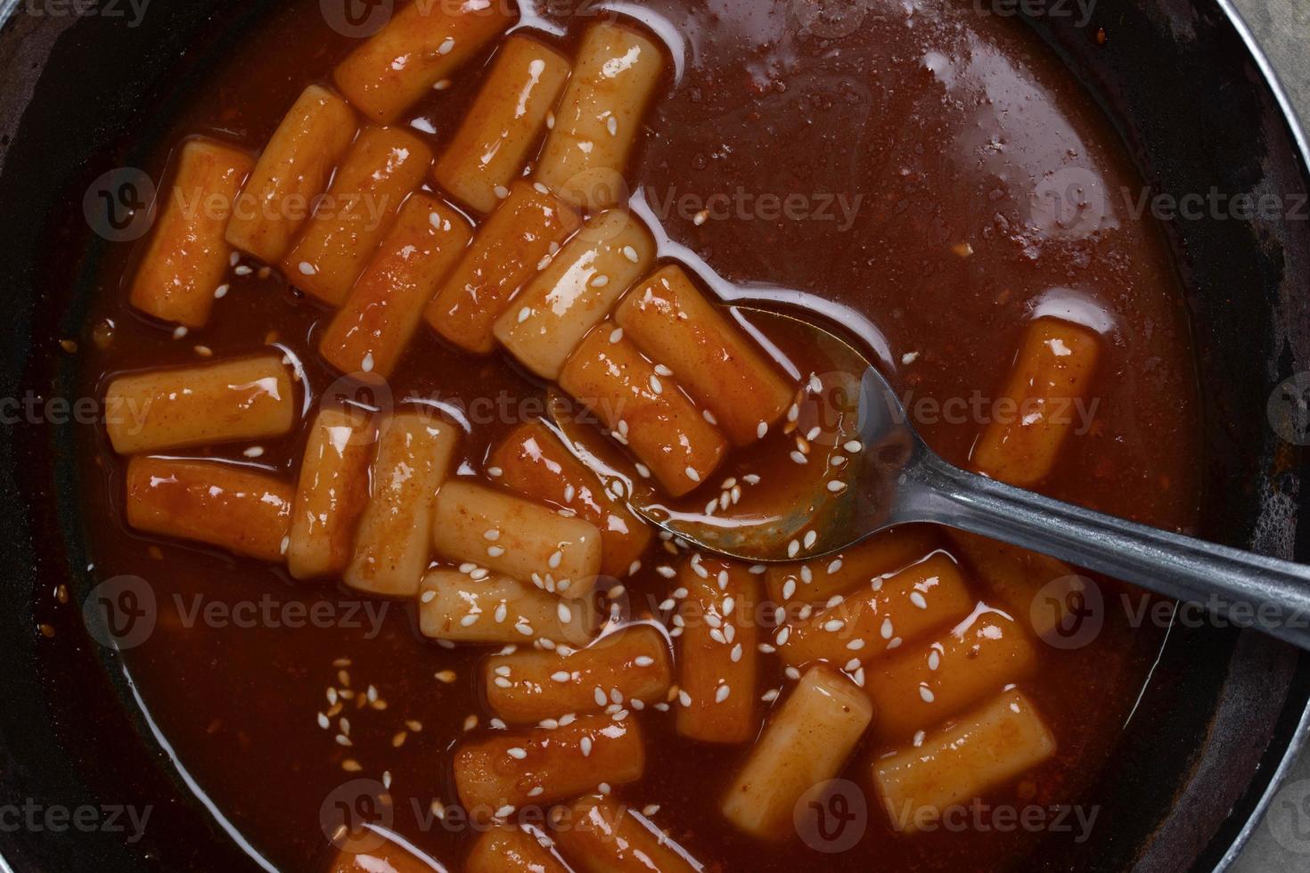 deep fried Korean rice cake tteokbokki, spicy tteokbokki, Korean style food. photo