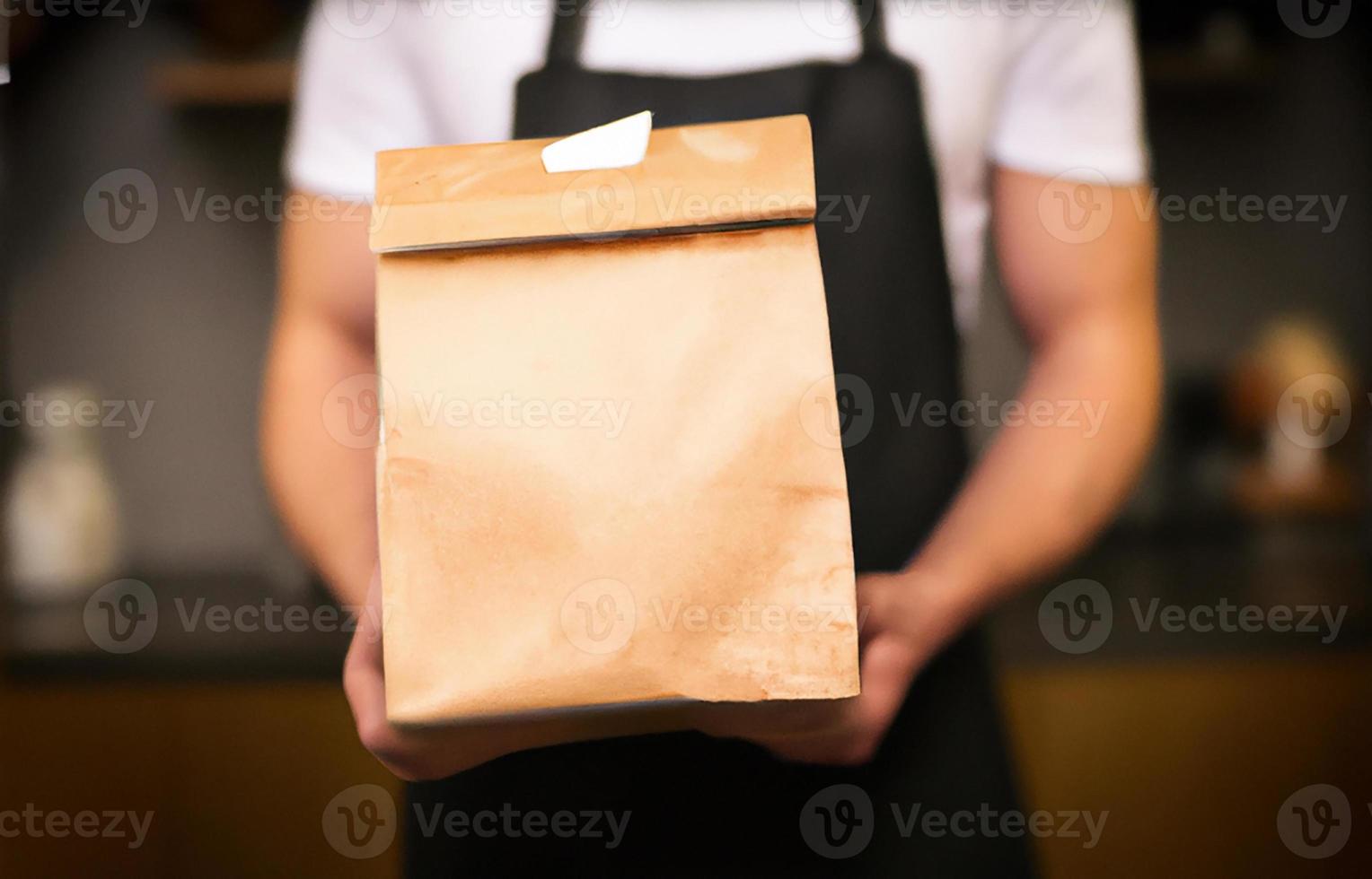 Various paper containers for take away food. delivery man carrying. photo