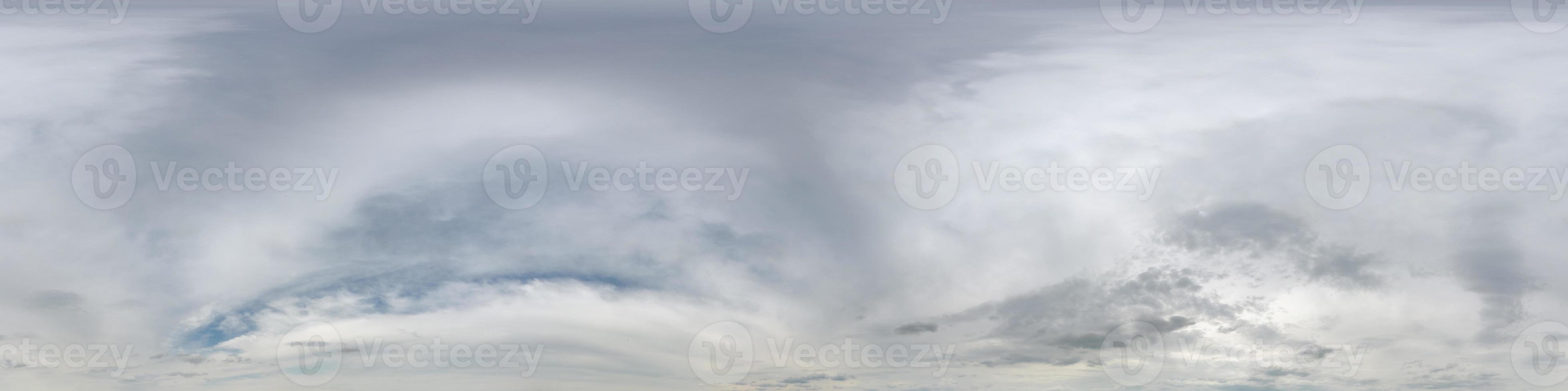 Seamless overcast blue sky hdri panorama 360 degrees angle view with zenith and beautiful clouds for use in 3d graphics as sky replacement and sky dome or edit drone shot photo