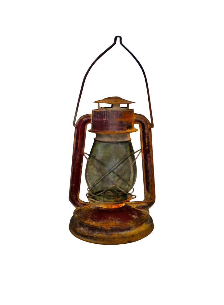 Old kerosene lamp on white background photo