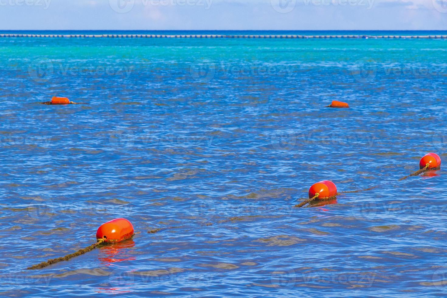 Blue water waves and ocean with buoy and ropes Mexico. photo