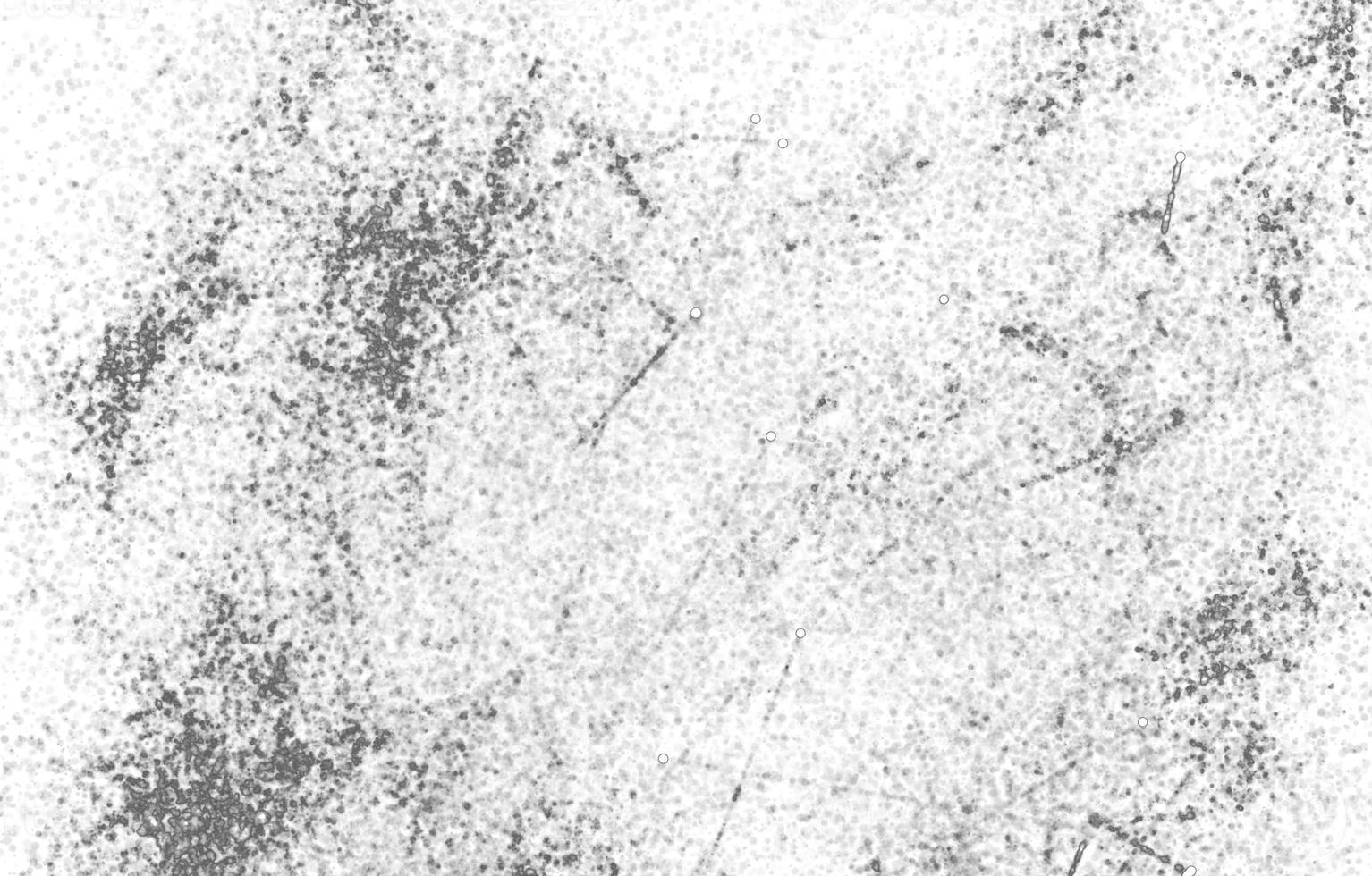 Monochrome particles abstract texture.Overlay illustration over any design to create grungy vintage effect and depth. photo