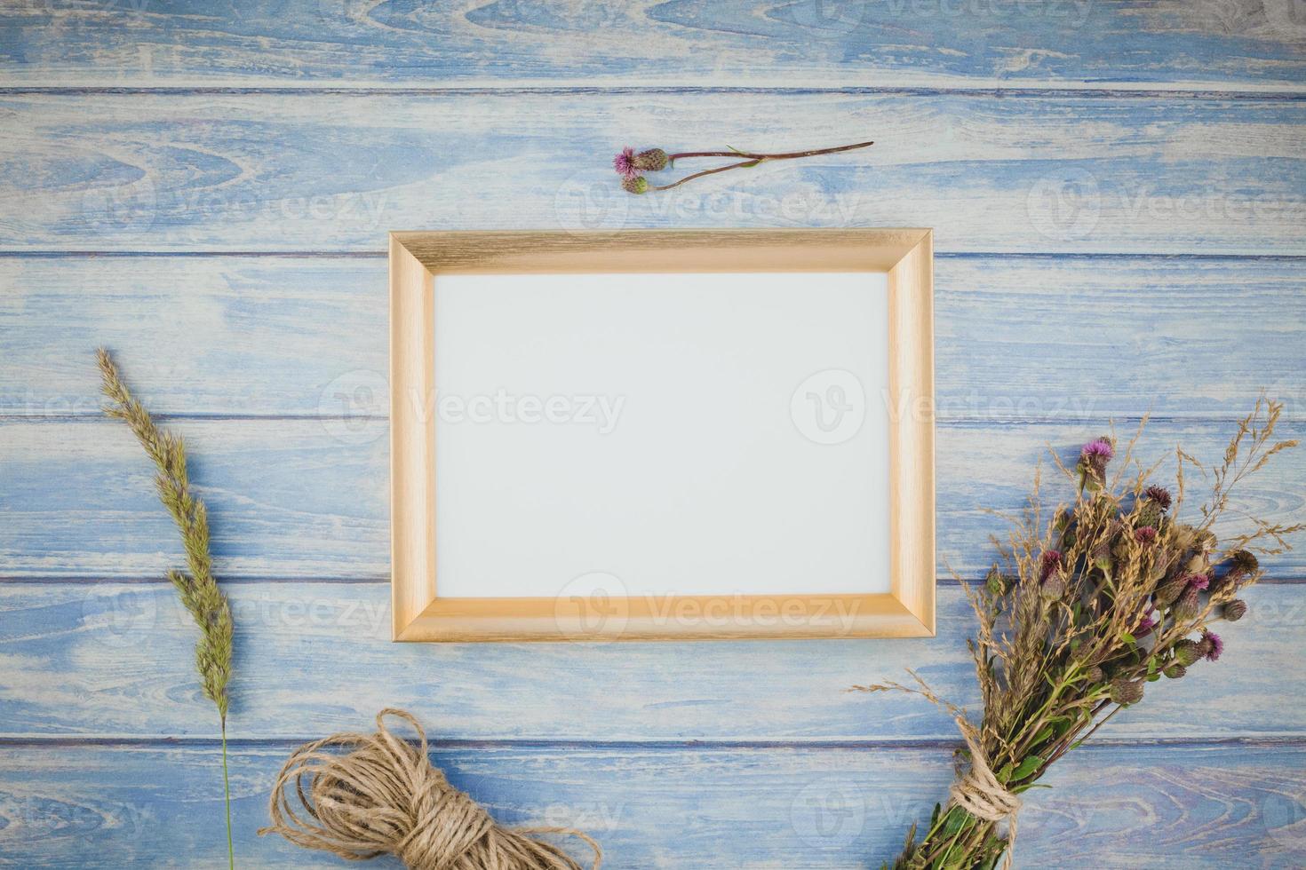 Golden frame mock up with autumn pumpkins photo