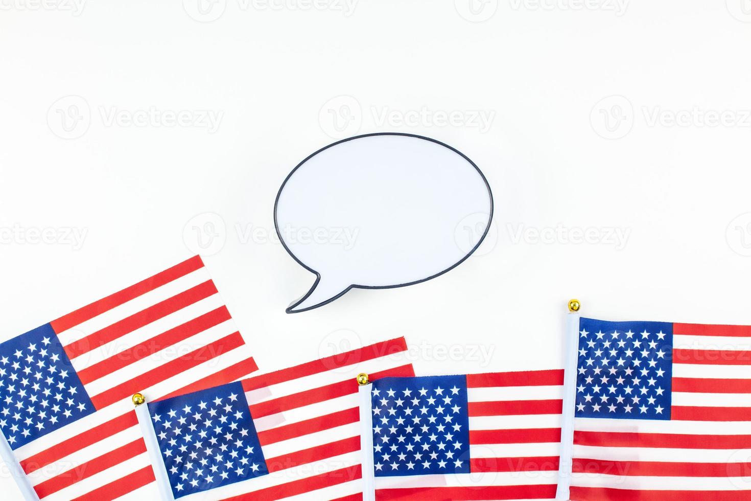 American flags on white background top view photo