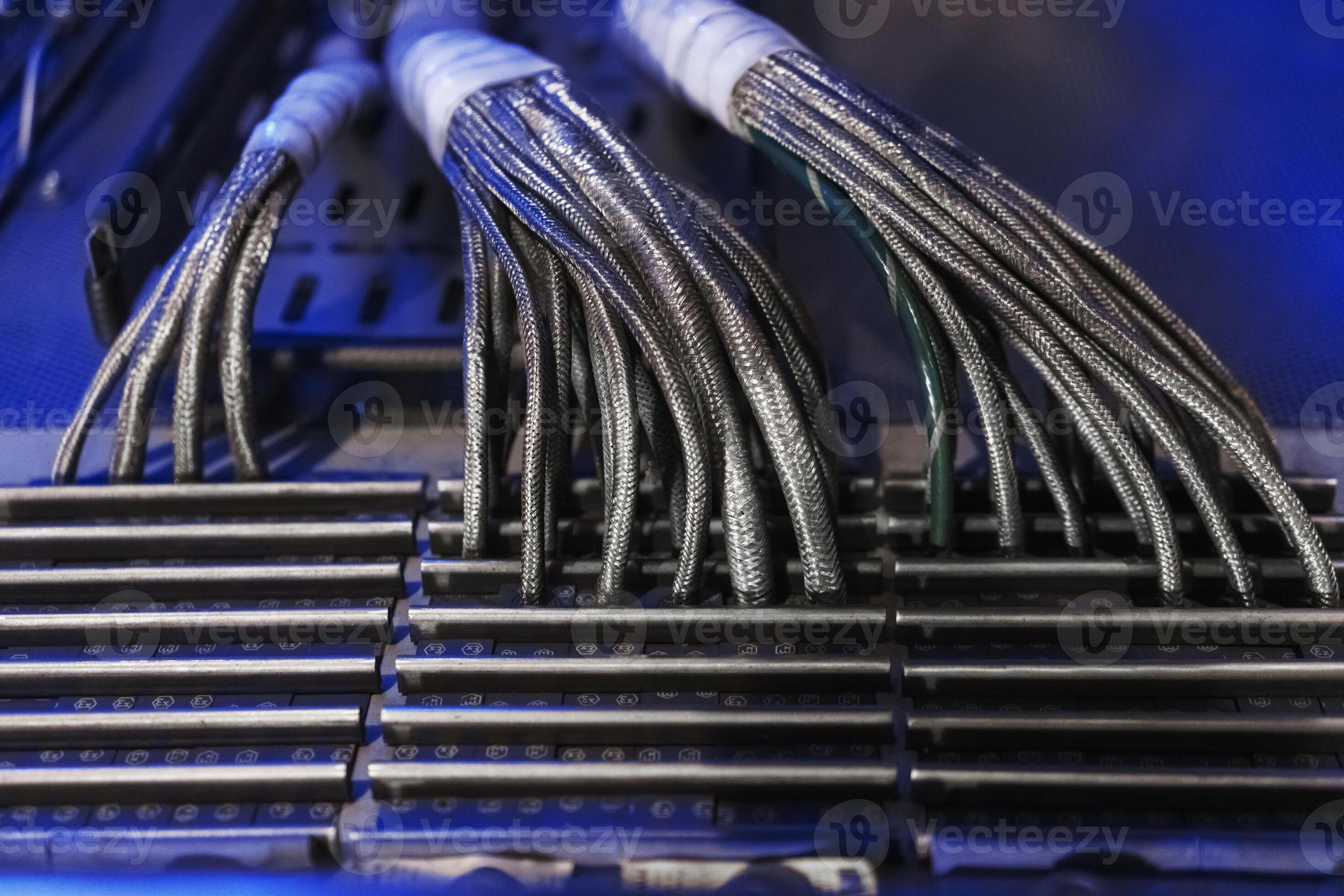 Technological wires in a metal sheath are laid in a cable channel to