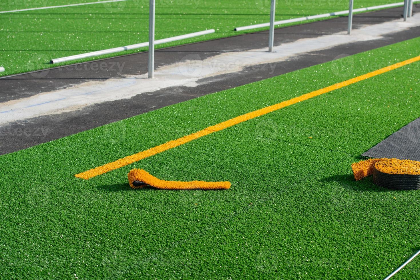 Laying of synthetic grass photo