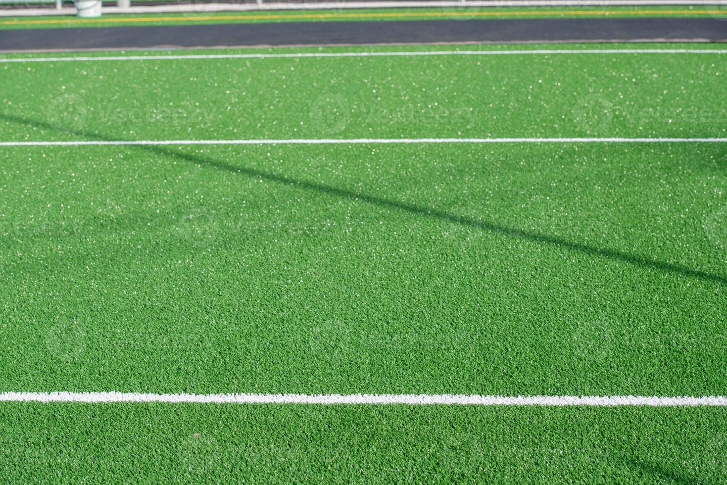 Laying of synthetic grass photo