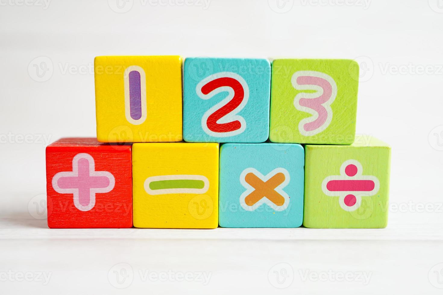 Number wood block cubes for learning Mathematic, education math concept. photo