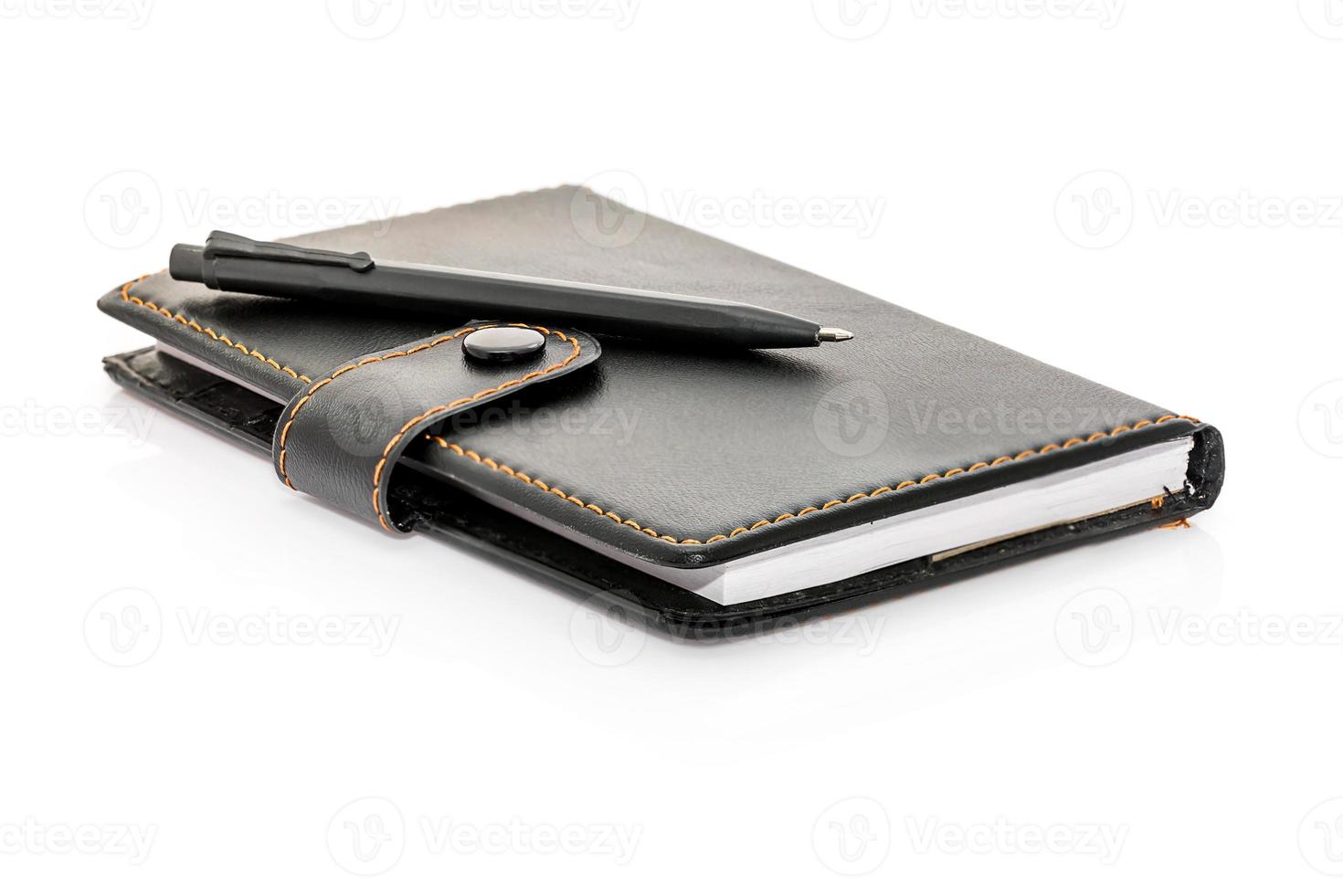 Pen put on the notebook 13086509 Stock Photo at Vecteezy