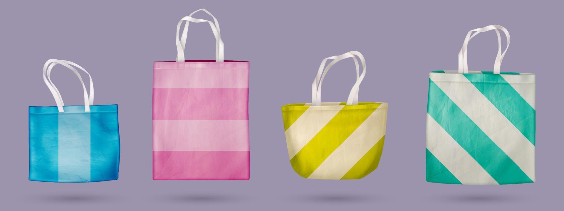 Realistic colorful fabric bags isolated on grey vector