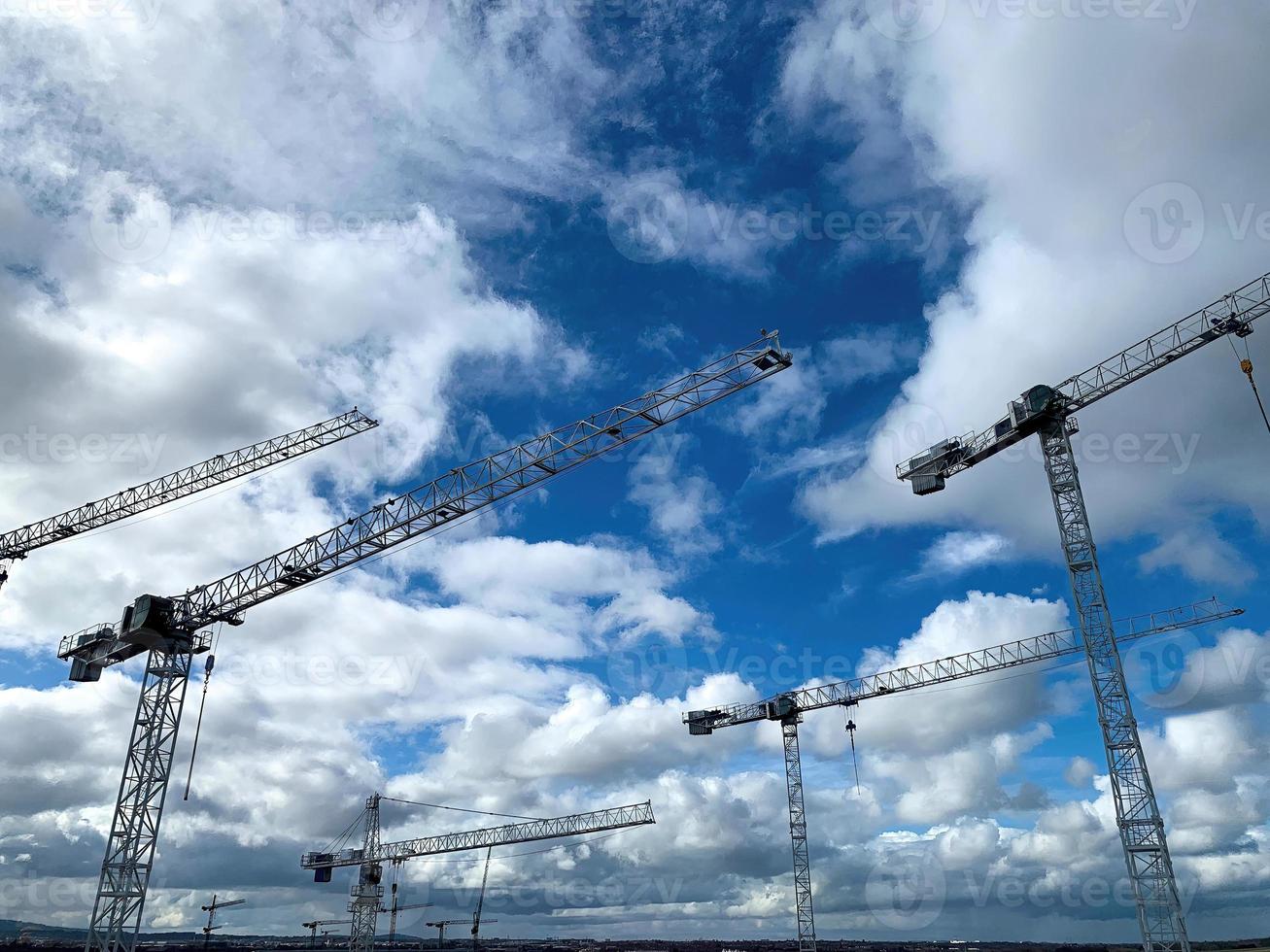 Cranes on a construction site photo