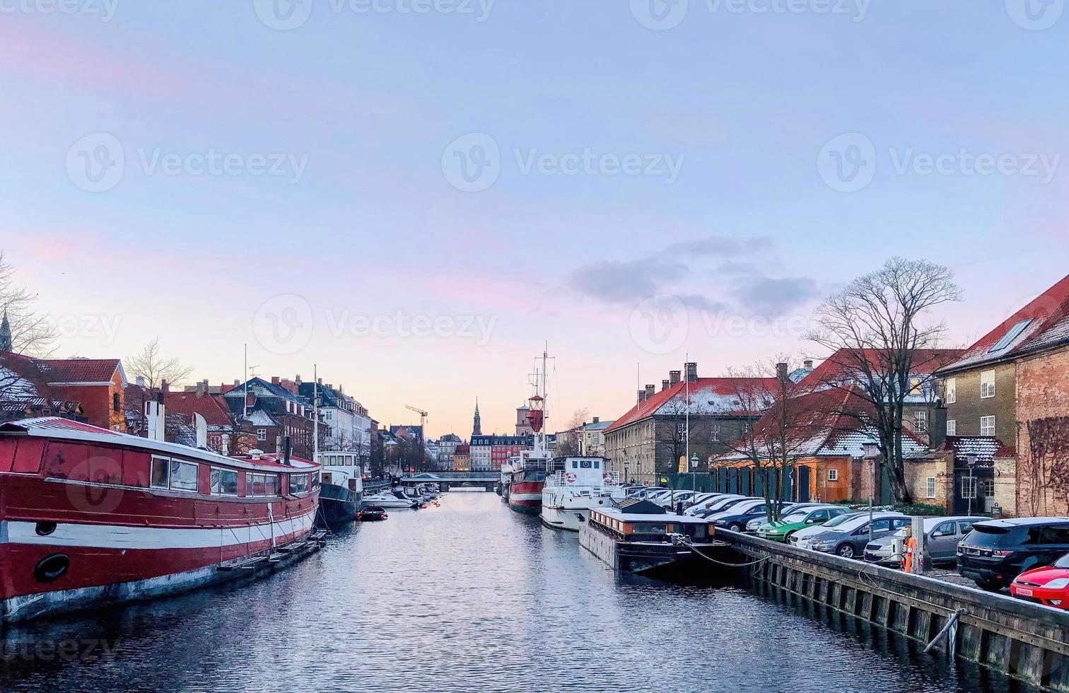 A canal in Copenhagen with a vintage view photo