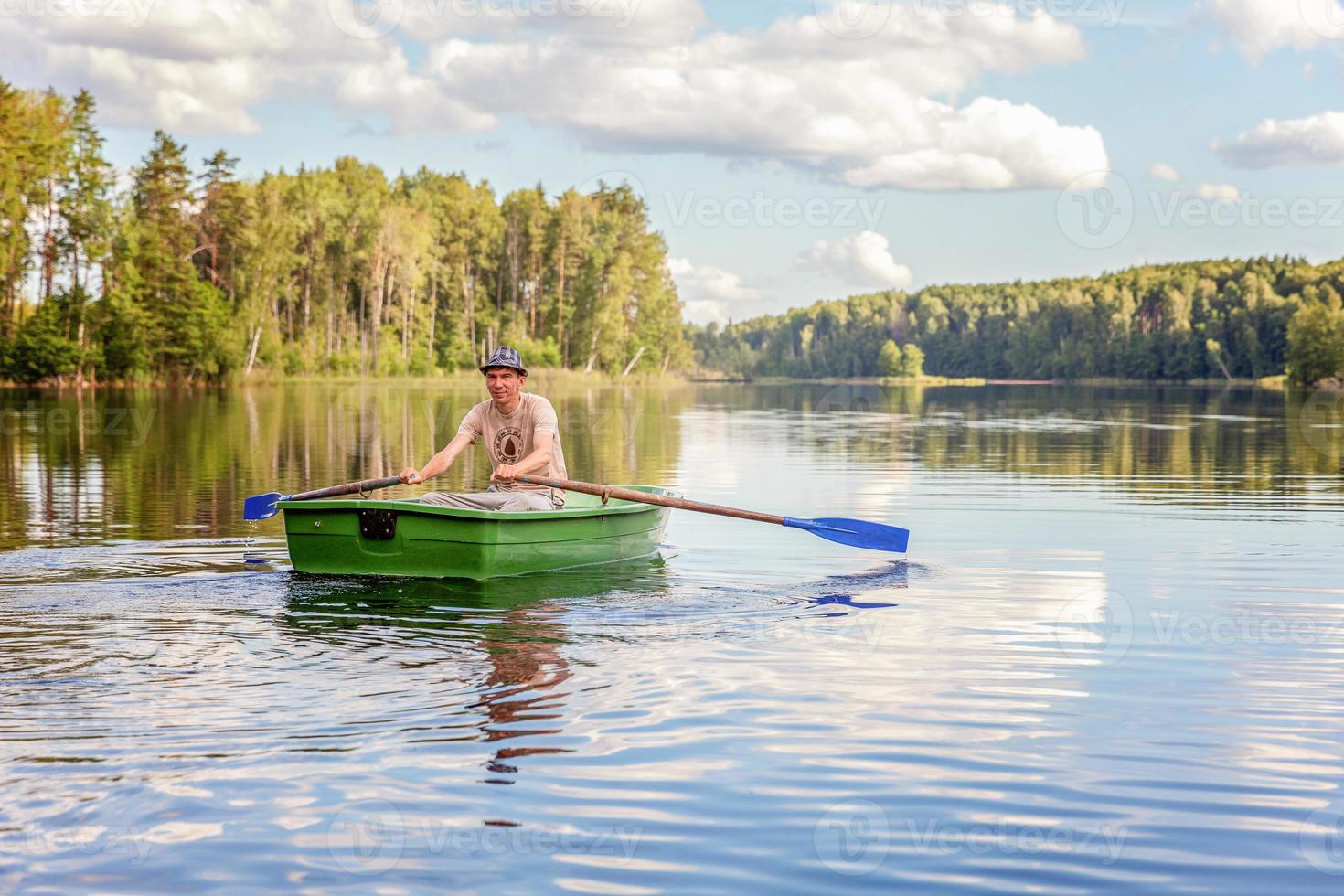 Fisherman in a boat photo